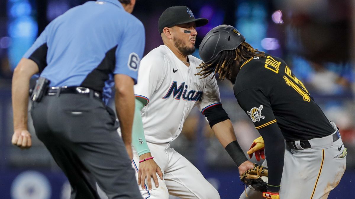 Miguel Rojas: Miami Marlins shortstop gets tooth knocked out but team  claims a walk-off victory in the 11th