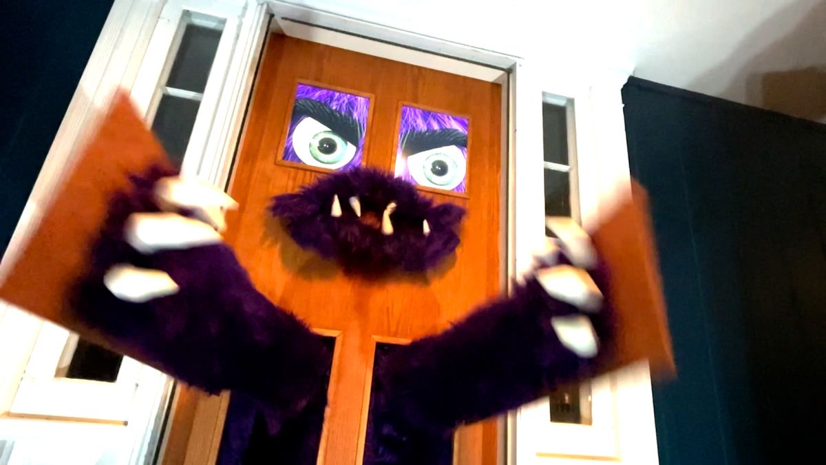 Halloween decorations: Iowa man creates monster door decoration that comes  to life - ABC7 Chicago