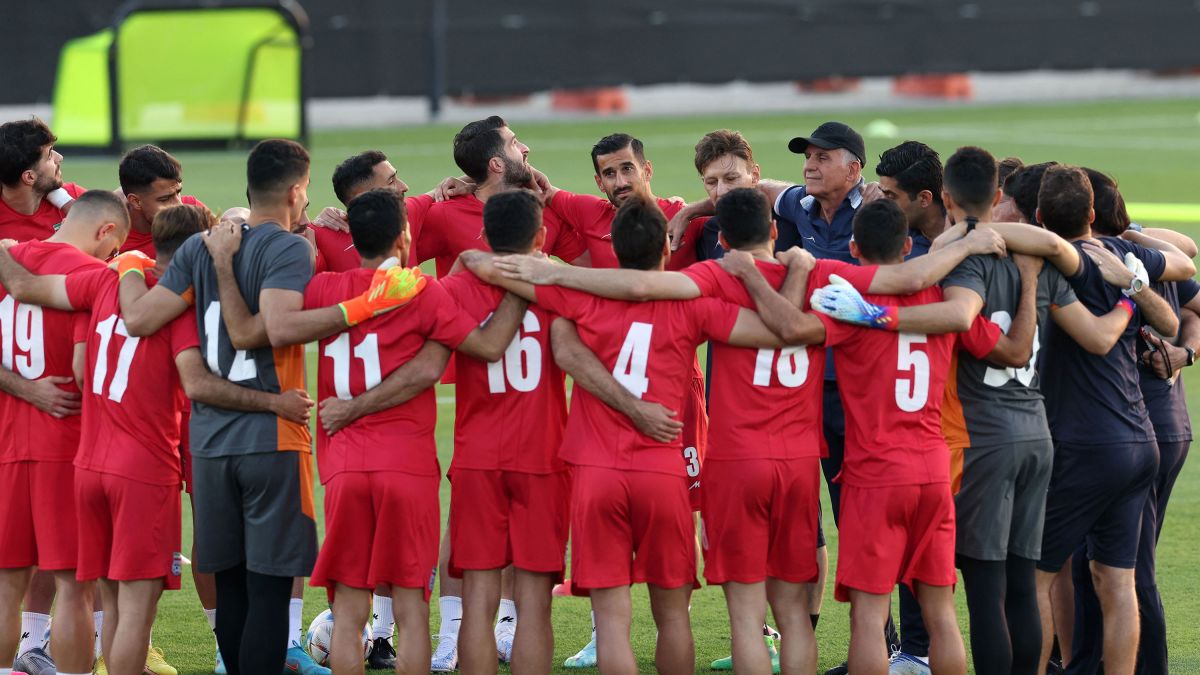 Short Pants and Long Sleeves: China's Soccer Team Plays Under