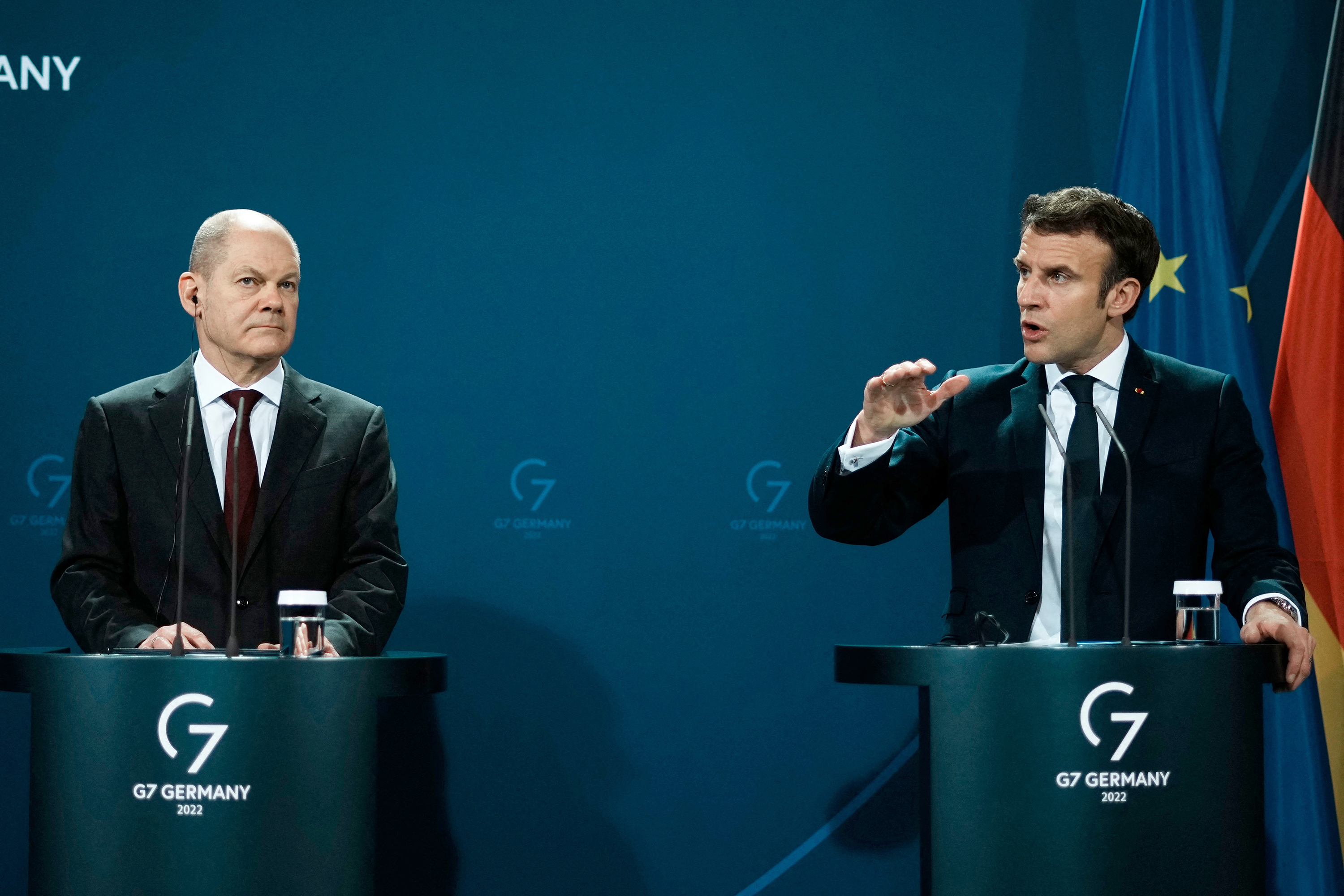 German Chancellor Olaf Scholz, left, and French President Emmanuel Macron attend a joint press conference on February 8, in Berlin, Germany. 