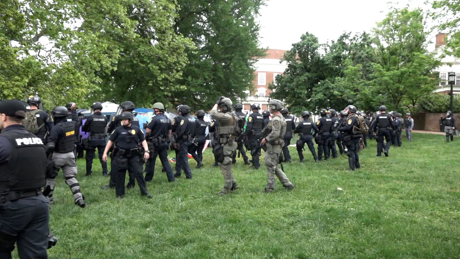Police move toward people protesting in a pro-Palestinian encampment at the University of Virginia in Charlottesville on May 4.