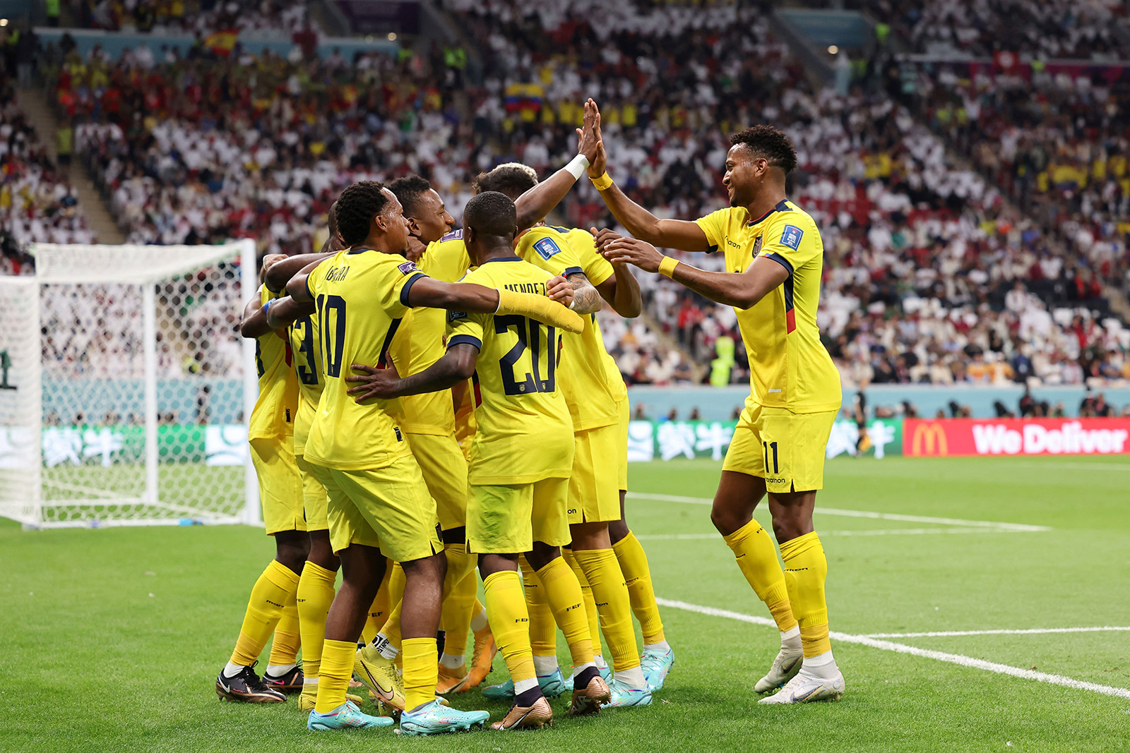 Ecuador celebrates after Enner Valencia scored on a penalty kick in the first half.