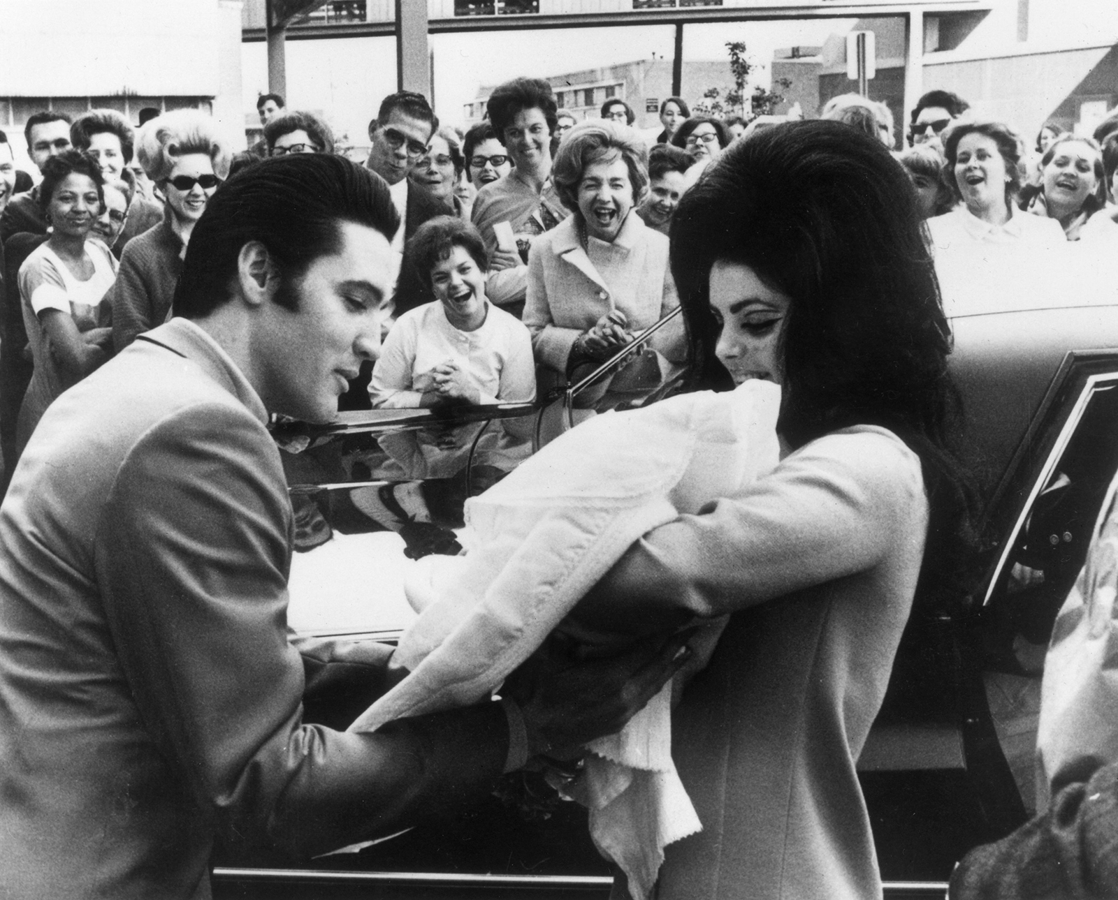 Elvis and Priscilla Presley hold their newborn daughter, Lisa Marie, in February 1968. She was born in Memphis, Tennessee. 