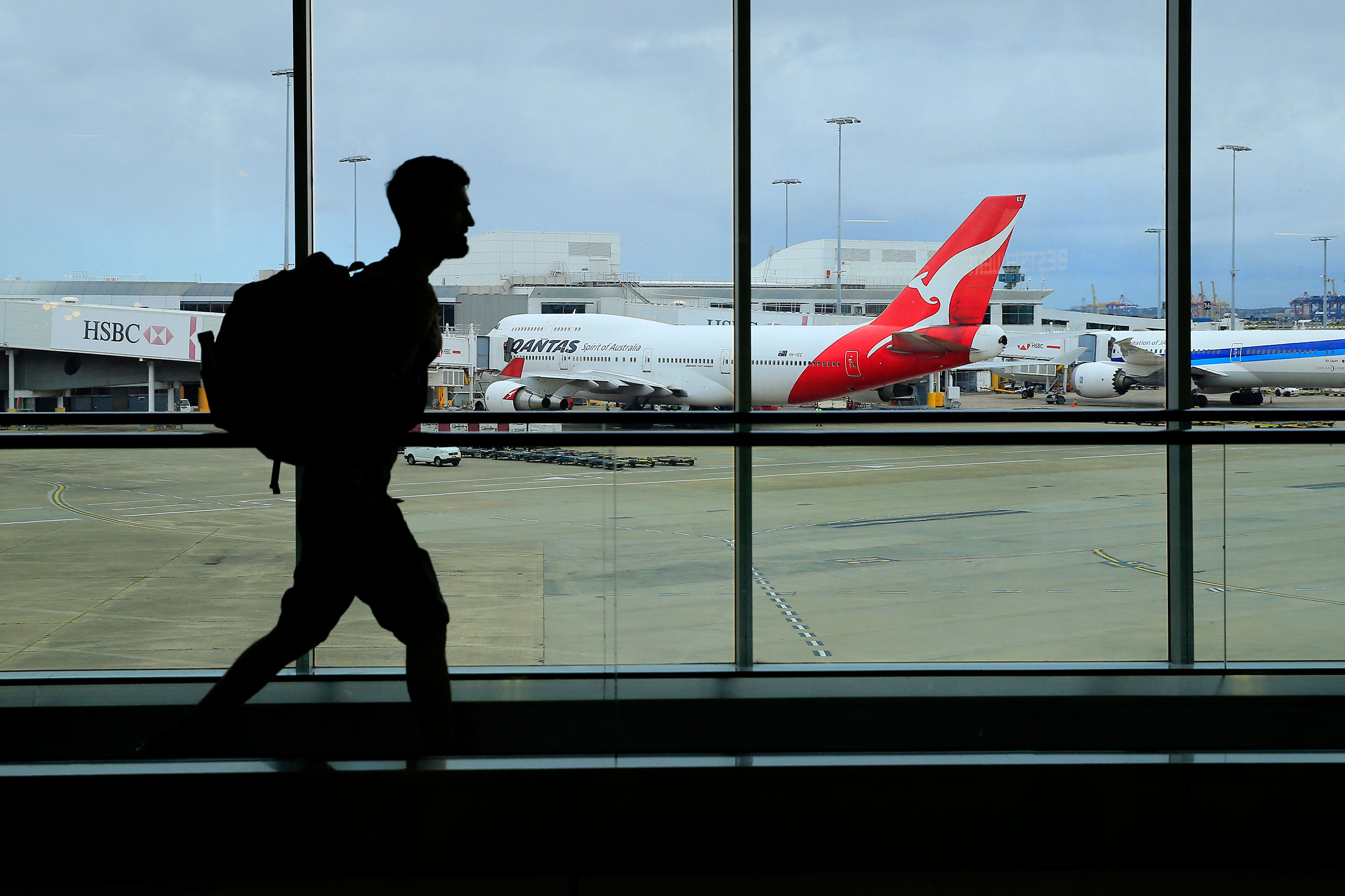A passenger walks through the international terminal of Sydney Airport on March 10 in Australia.