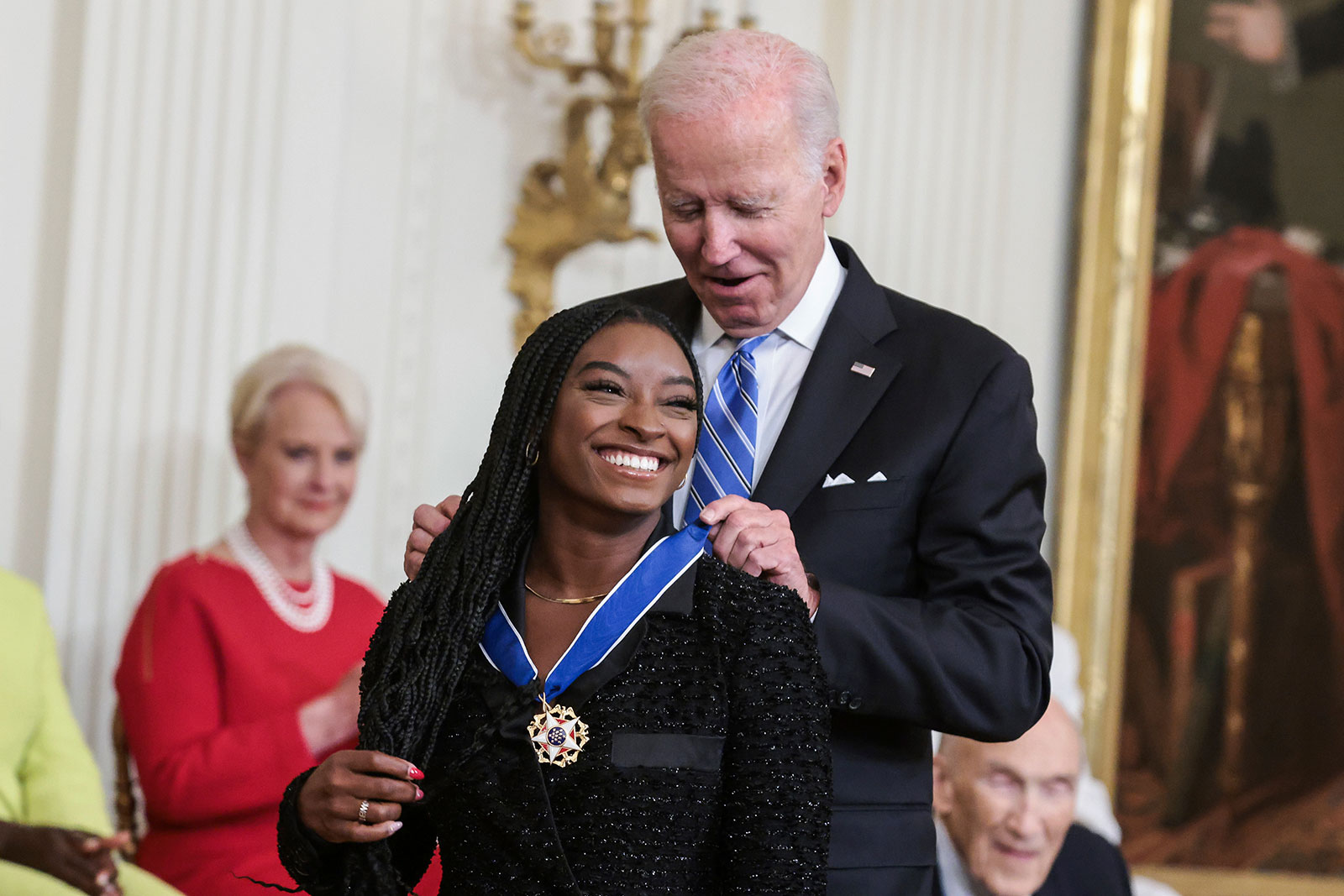 American gymnast Simone Biles receives the presidential Medal of Freedom from President Joe Biden on July 7 in Washington, DC.