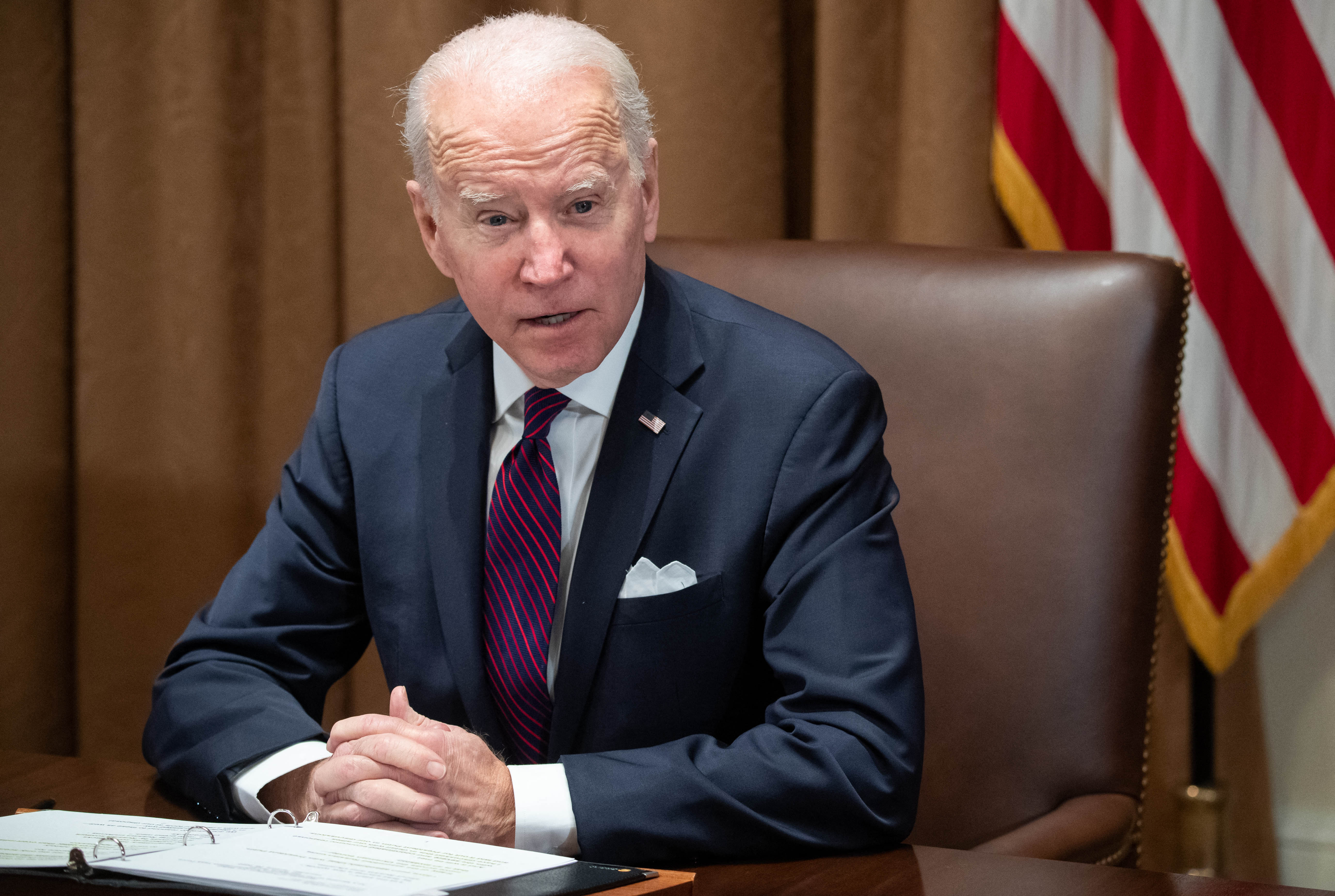 US President Joe Biden speaks about Russia and Ukraine prior to a meeting with members of the Infrastructure Implementation Task Force to discuss the Bipartisan Infrastructure Law, in the Cabinet Room of the White House in Washington, DC, on 20 January.
