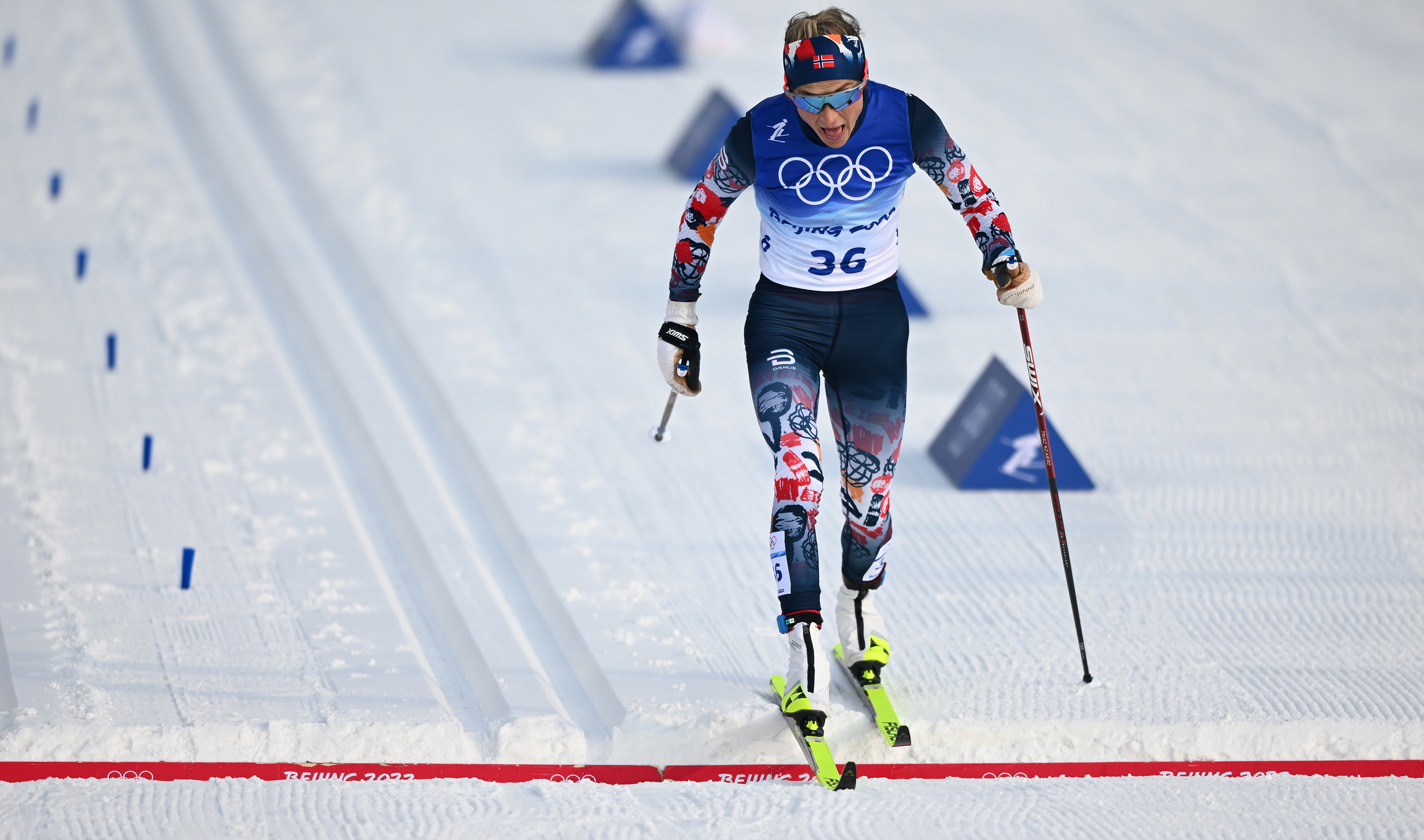 Norway's Therese Johaug crosses the finish line to win her second gold of the Games.