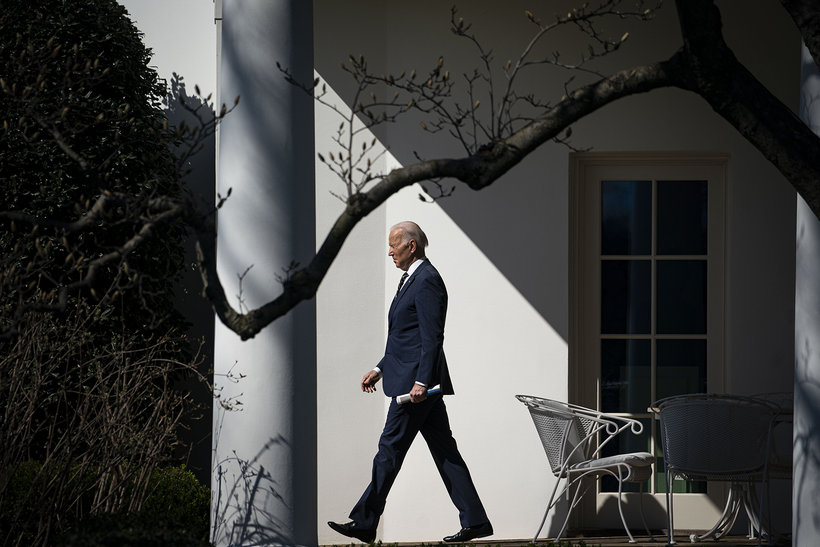 US President Joe Biden exits the Oval Office of the White House in Washington, on March 11.
