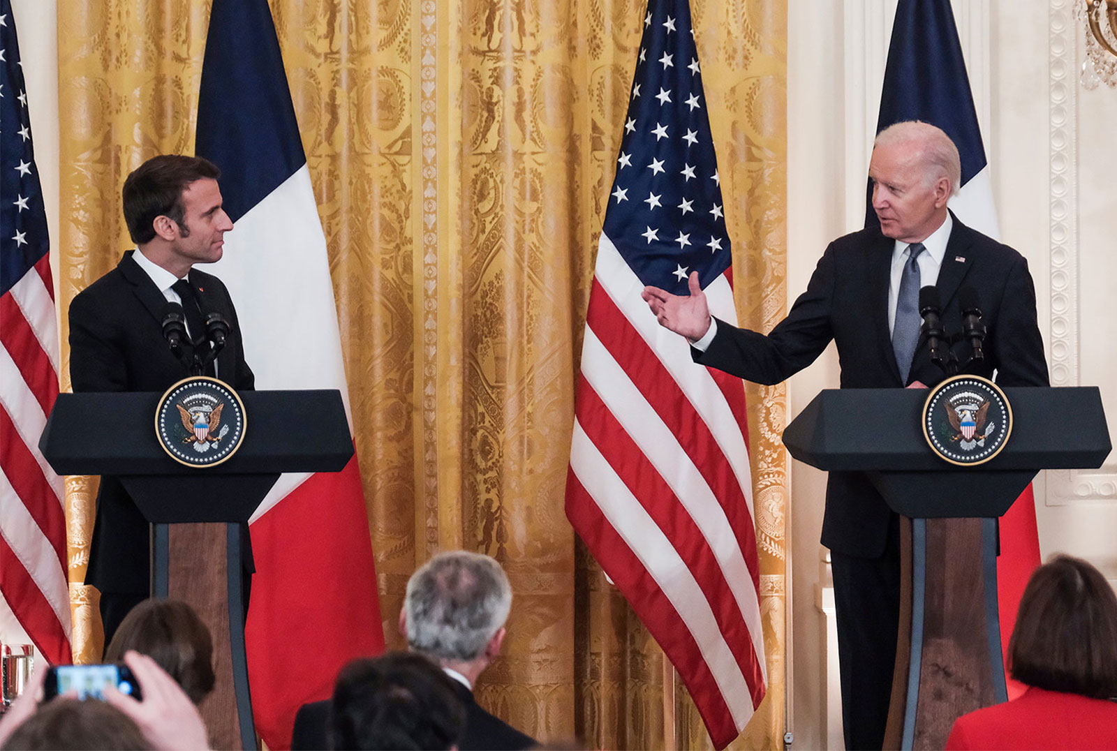 French President Emmanuel Macron and President Joe Biden speak at a joint press conference in the East Room of The White House on Thursday. 