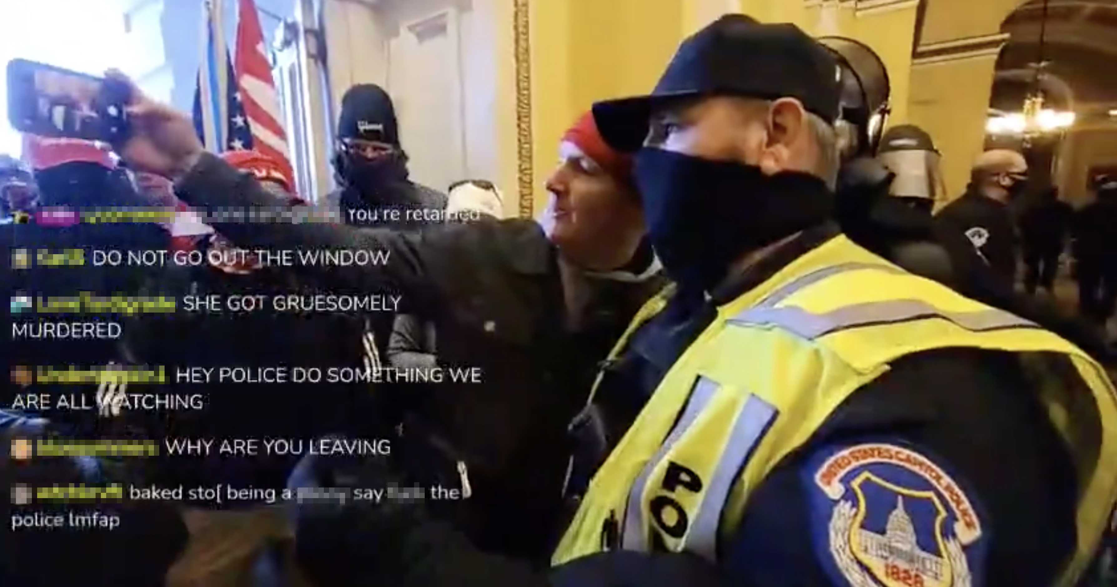 The video appears to show a Capitol cop taking a selfie with a rowdy