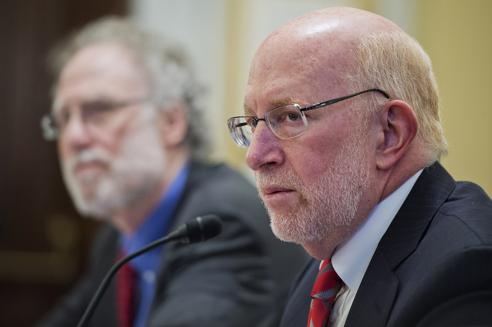 Benjamin Ginsberg, right, prepares to testify before a Senate Rules and Administration Committee hearing in Russell Building titled "Bipartisan Support for Improving U.S. Elections: An Overview from the Presidential Commission on Election Administration," on February 12, 2014.
