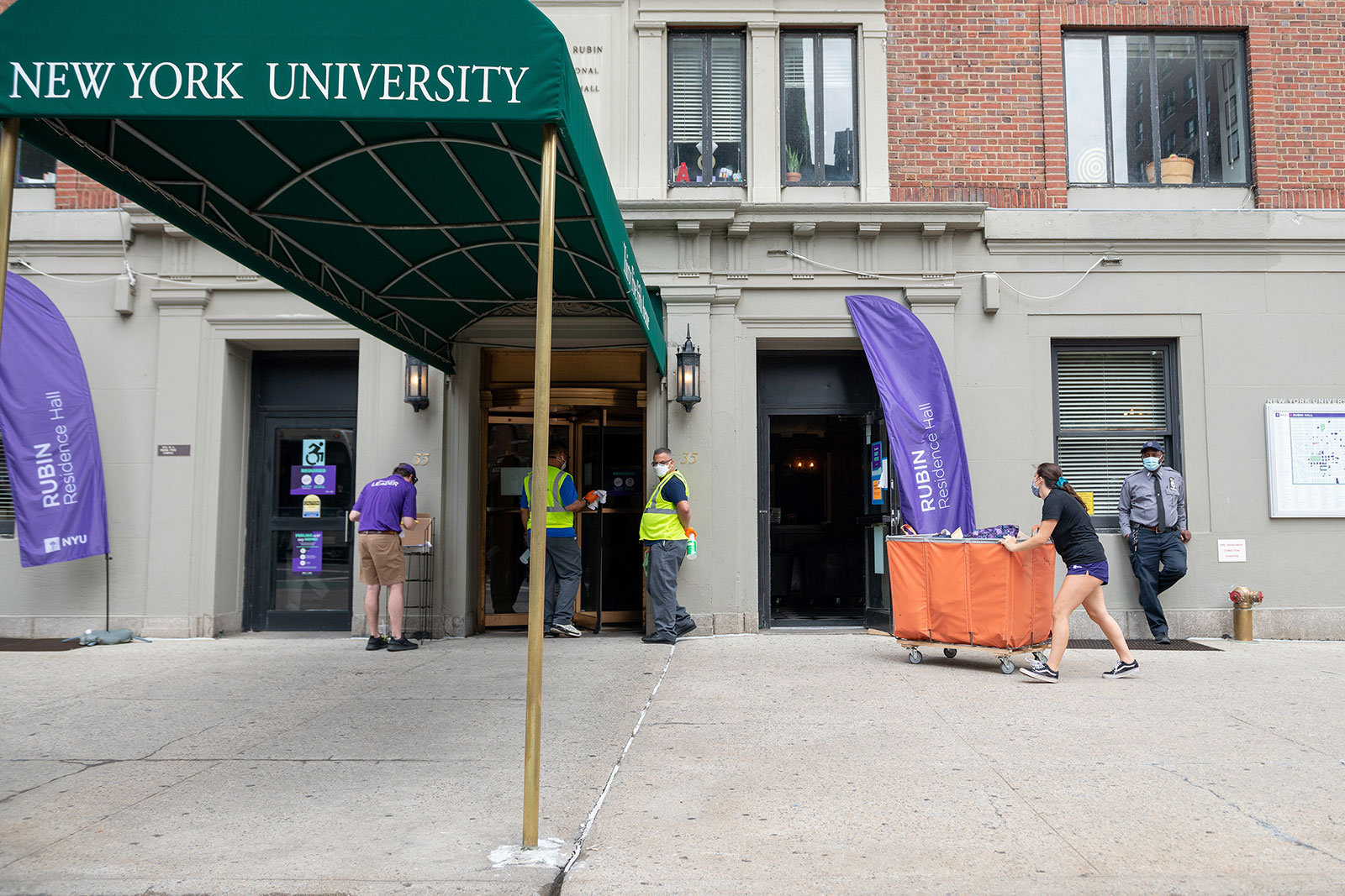 A student moves belongings into NYU's Rubin Hall on August 19.
