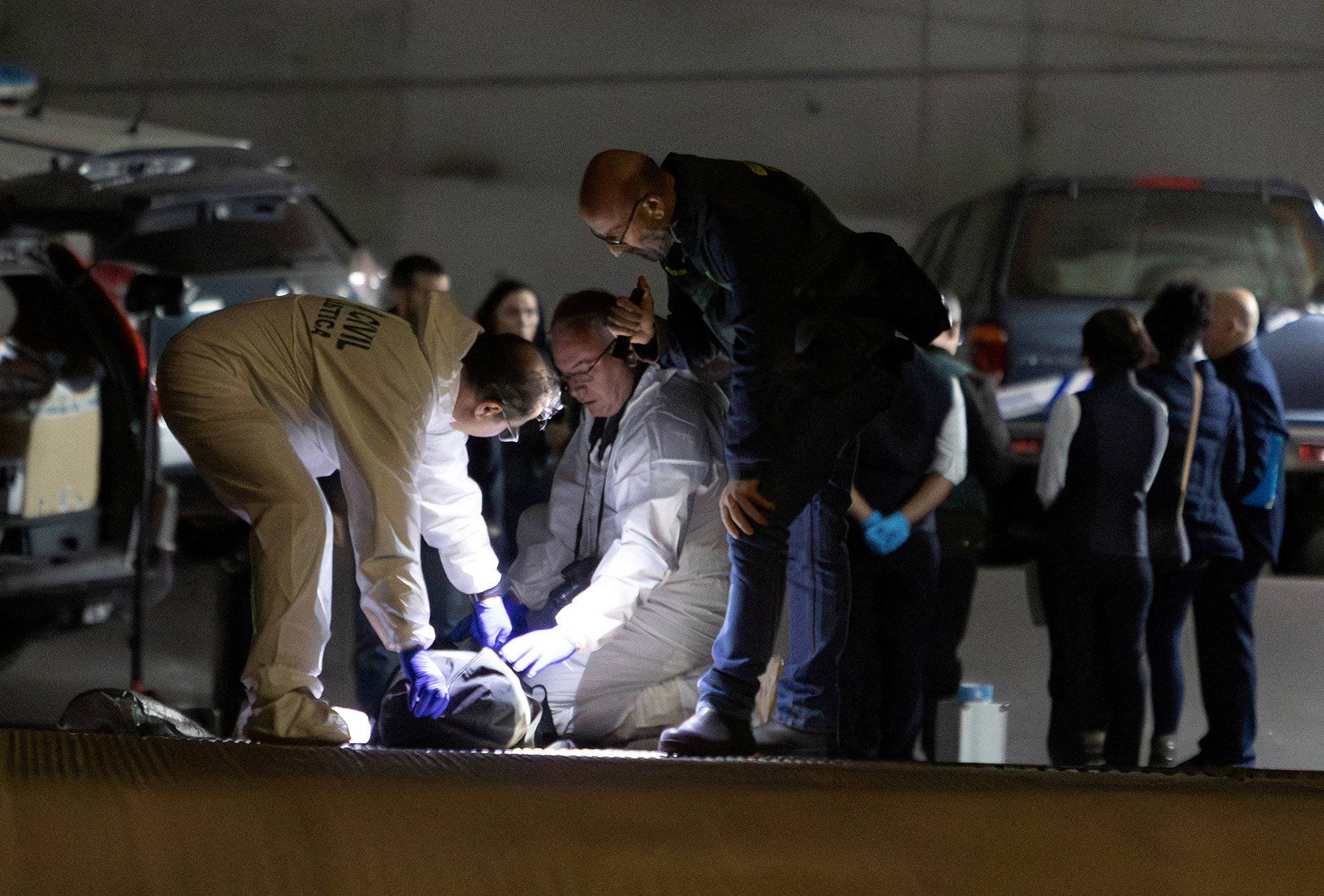 Spanish Civil Guard officers investigate the garage where the body of Russian pilot Maxim Kuzminov was found in Villajoyosa, Spain, on February 13.