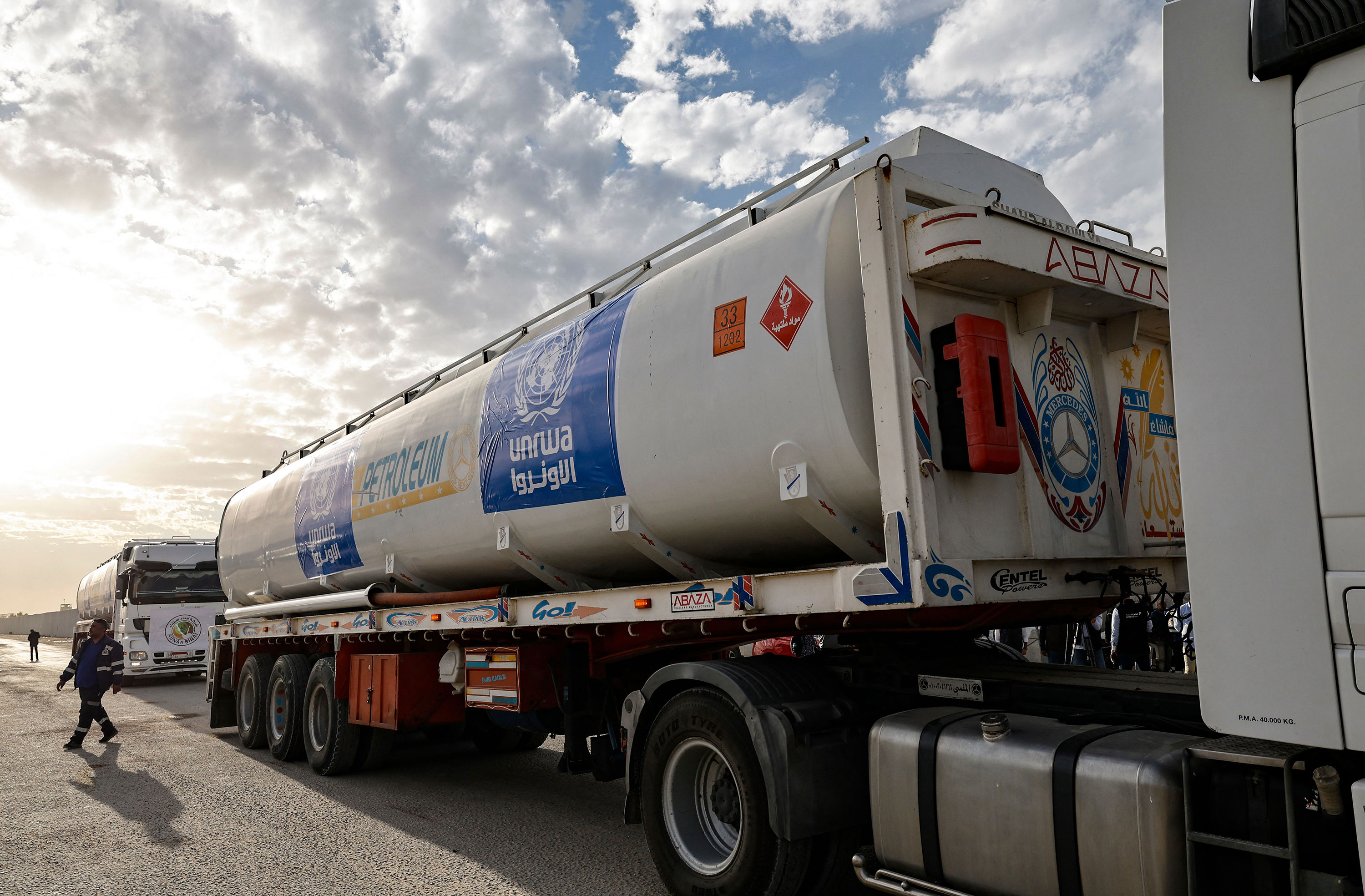 UN Relief and Works Agency for Palestine Refugees in the Near East (UNRWA) trucks carrying fuel arrive at the Egyptian side of the Rafah border crossing with Gaza on November 22, 2023. 