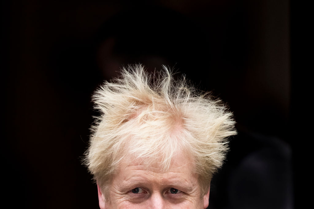 Boris Johnson leaves 10 Downing Street on his way to Parliament on Wednesday morning.