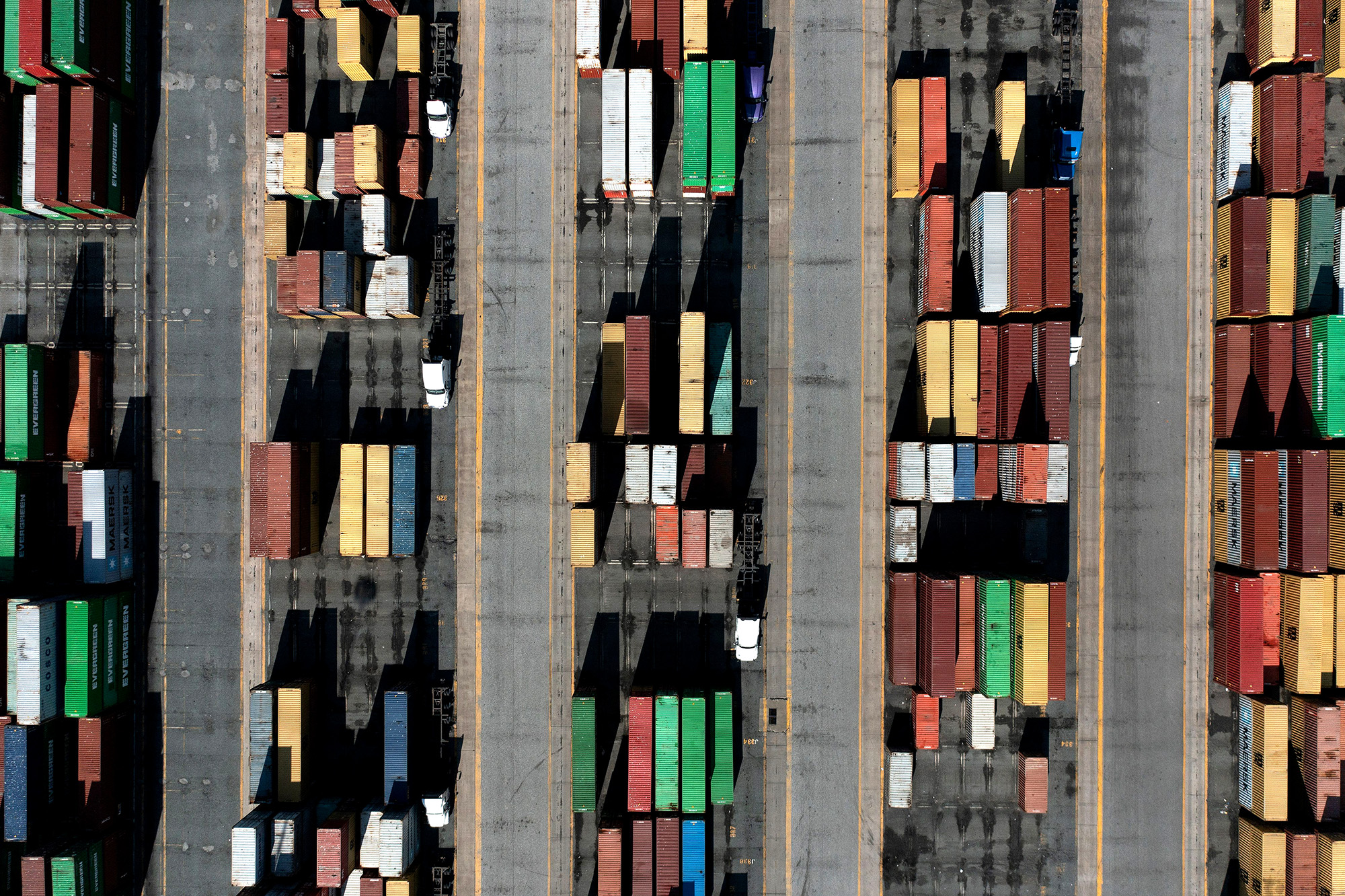 In this aerial image cargo containers are readied for transport at the Port of Baltimore in Baltimore, Maryland, on October 14, 2021. 