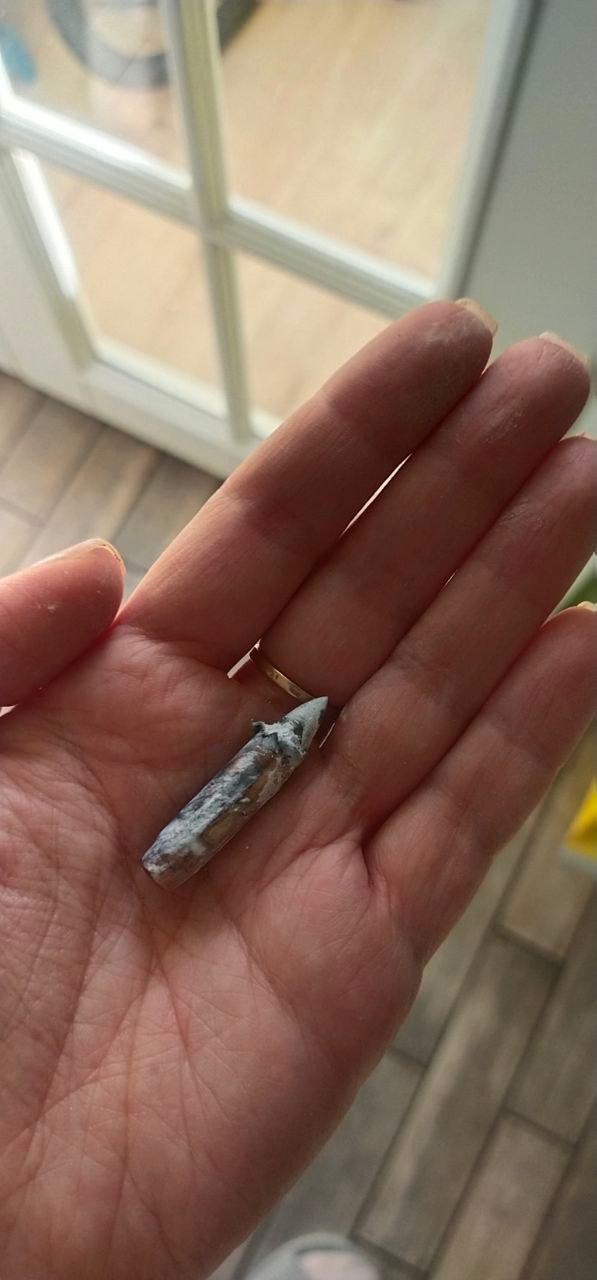 One the projectiles that entered the family home.