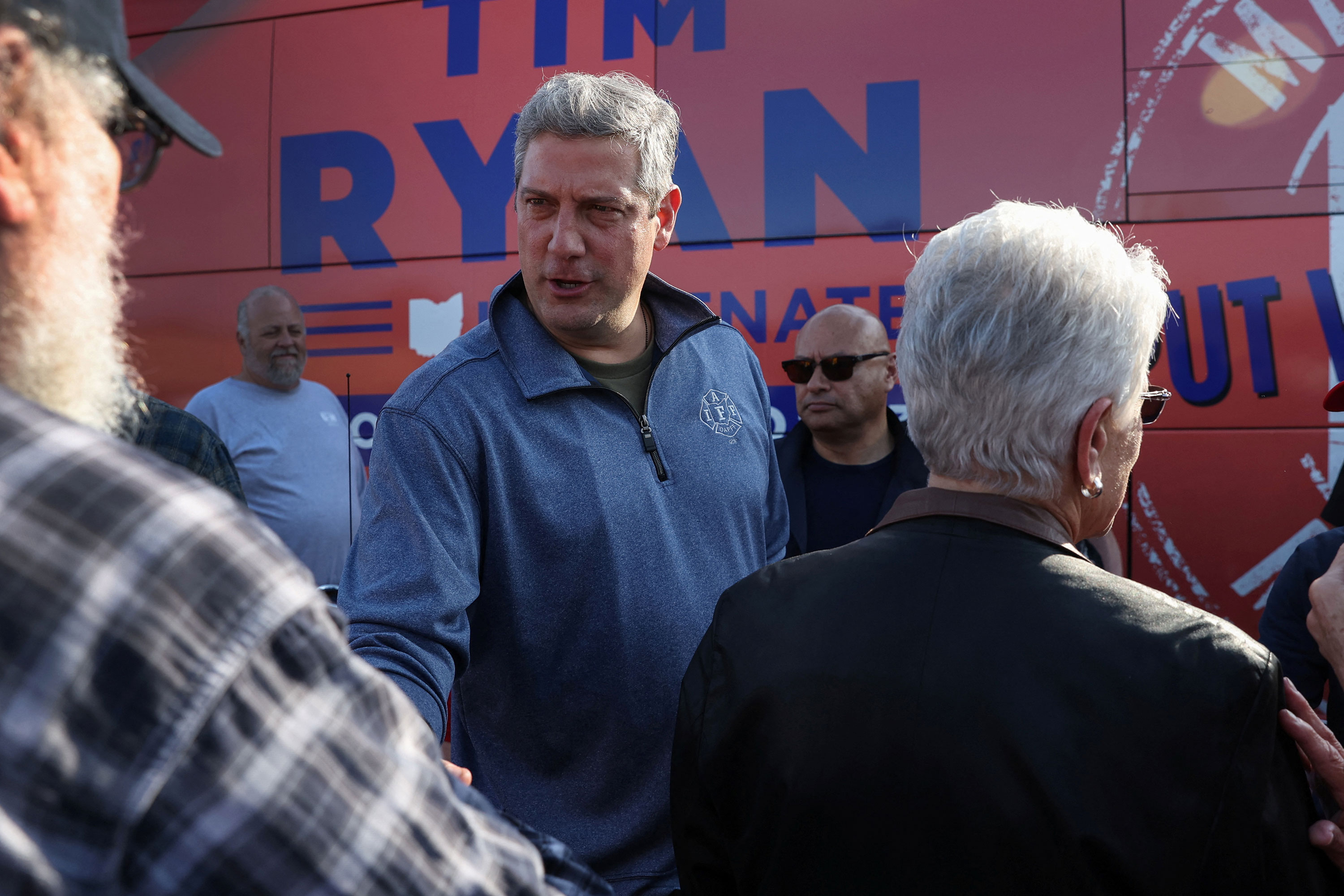 Rep. Tim Ryan shakes hands with supporters during a campaign stop in Toledo, Ohio, on Wednesday.