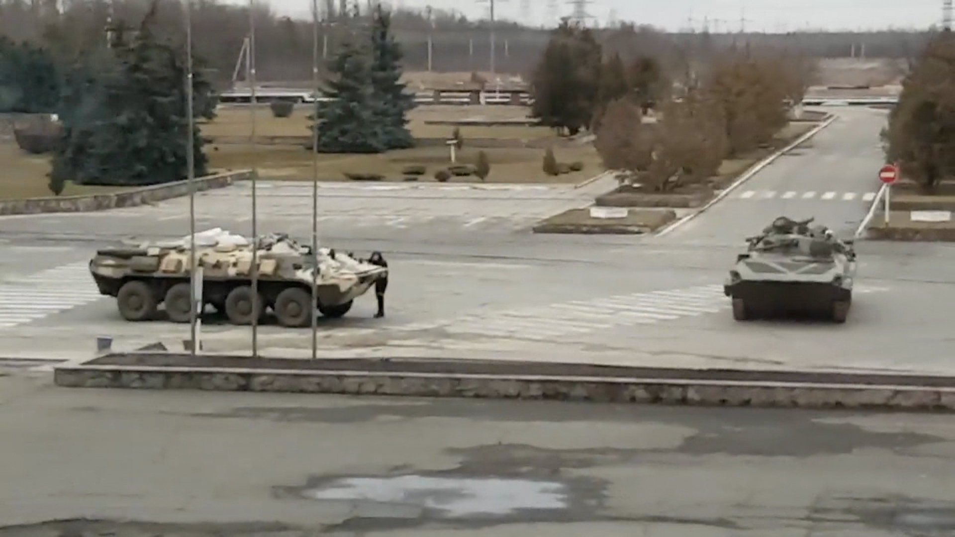 Russian military vehicles are seen at Chernobyl near Pripyat, Ukraine, in this screenshot taken from a video uploaded to social media in late February.