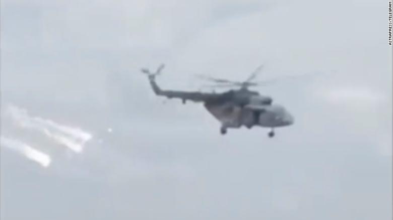 A helicopter circles over Russia's Belgorod region, the site of fighting between Russian defectors and pro-Kremlin troops amid the war in Ukraine.