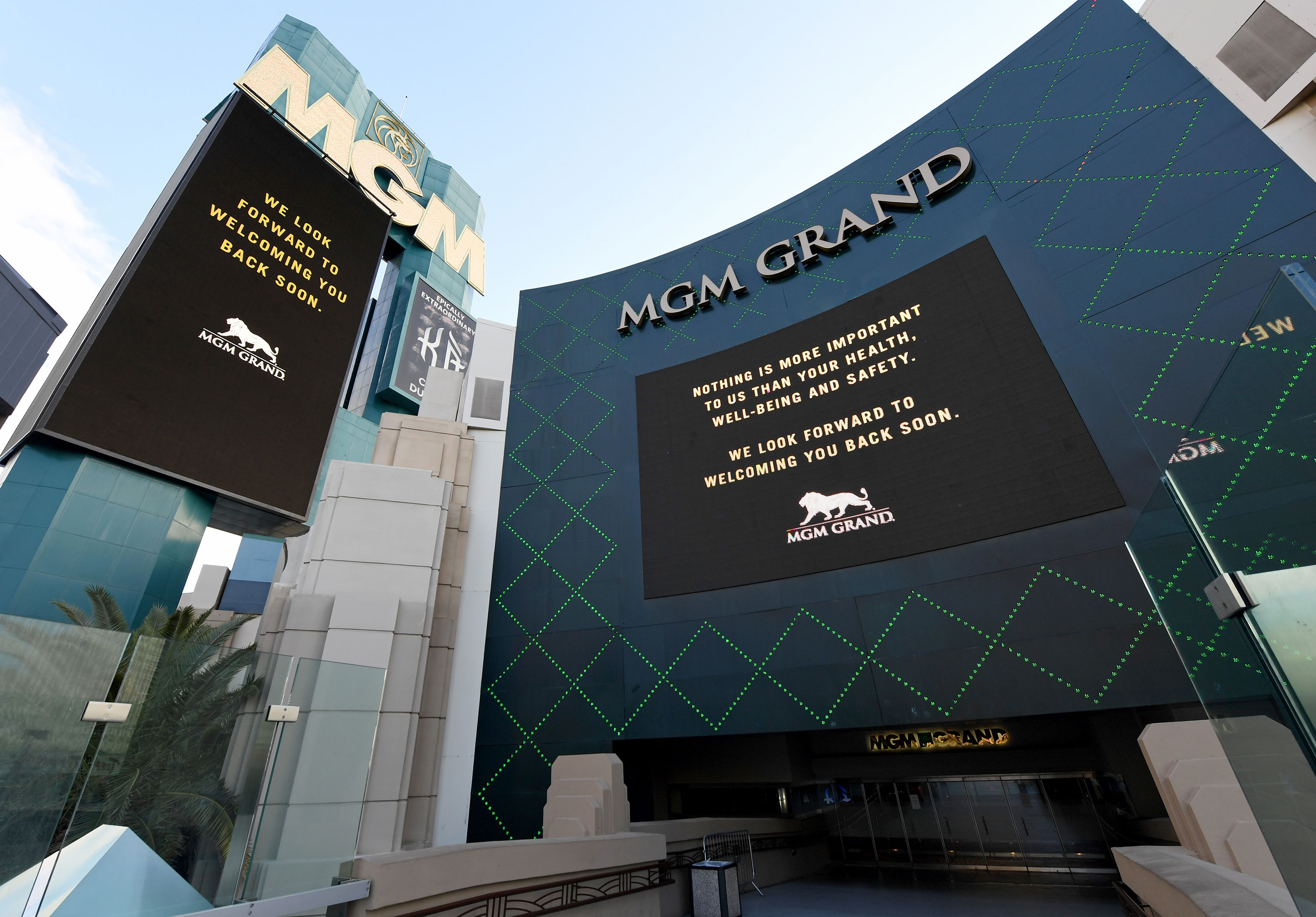 The marquee and sign at an entrance of the MGM Grand & Hotel & Casino display messages after the Las Vegas Strip resort was closed as a precaution against coronavirus on March 17 in Las Vegas. 