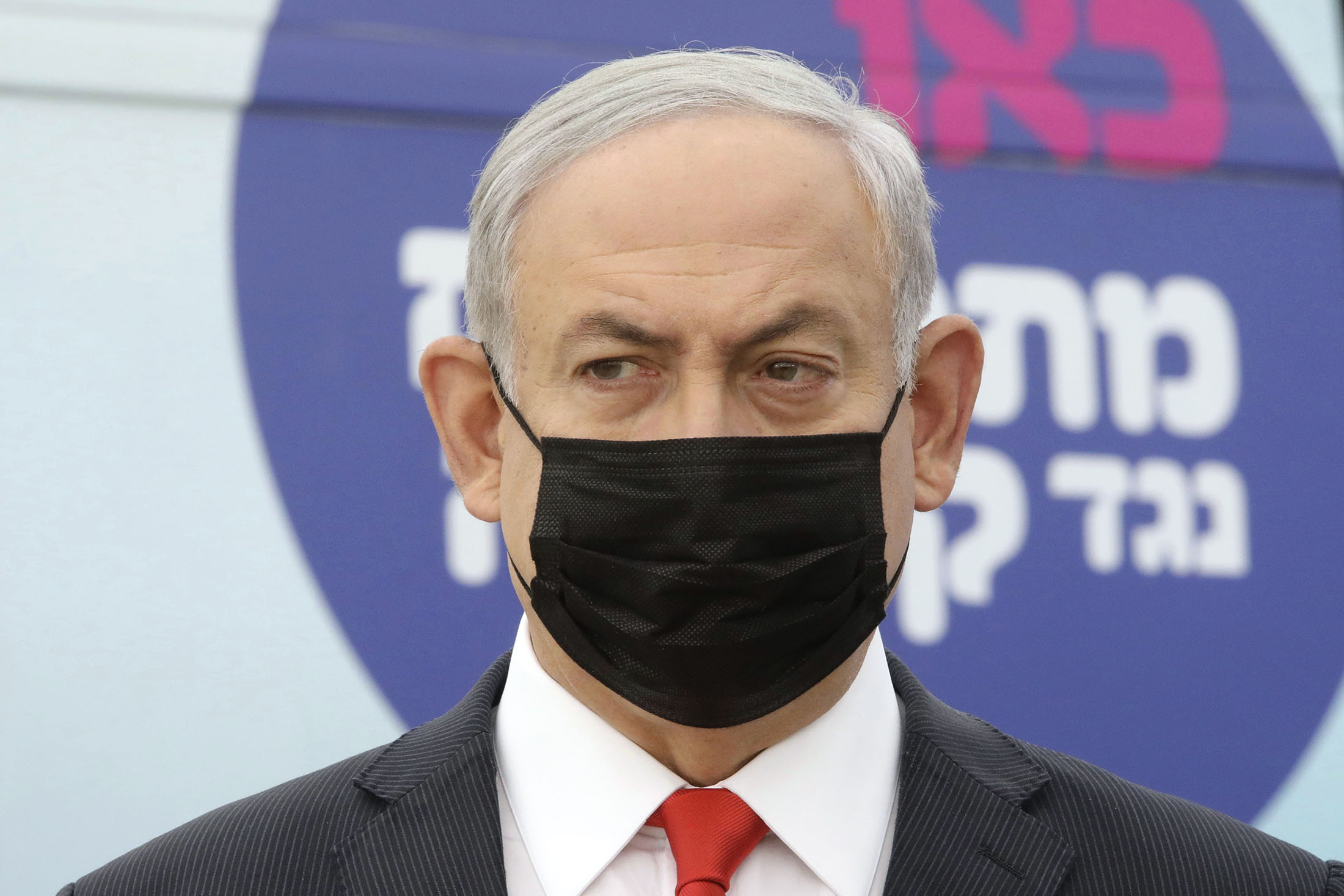 Israeli Prime Minister Benjamin Netanyahu visits the Maccabi Healthcare Services vaccine complex for COVID-19, in Tel Aviv, Israel, December 13. 