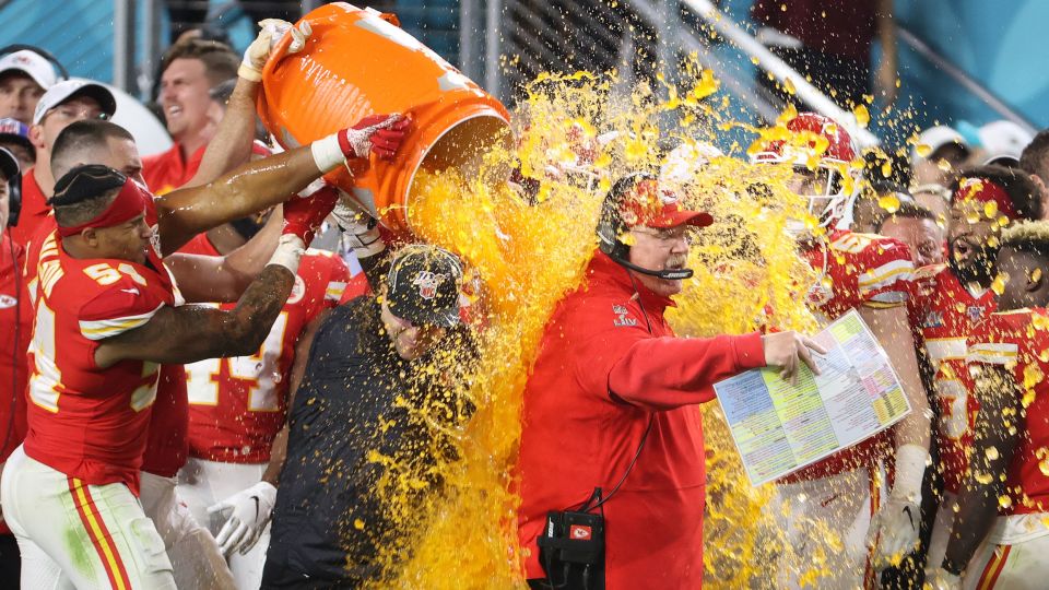 Kansas City Chiefs head coach Andy Reid is dunked with Gatorade by his players Jordan Lucas (24) and Cameron Erving (75) in the fourth quarter against the San Francisco 49ers in Super Bowl LIV in 2020. 