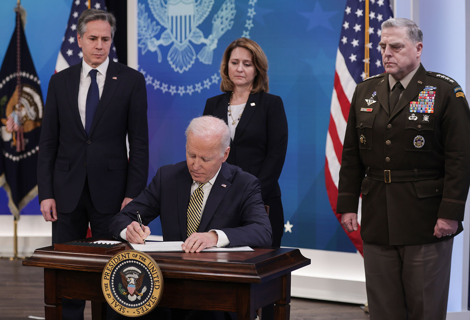 US President Joe Biden signs legislative action to provide security aid and support to Ukraine.