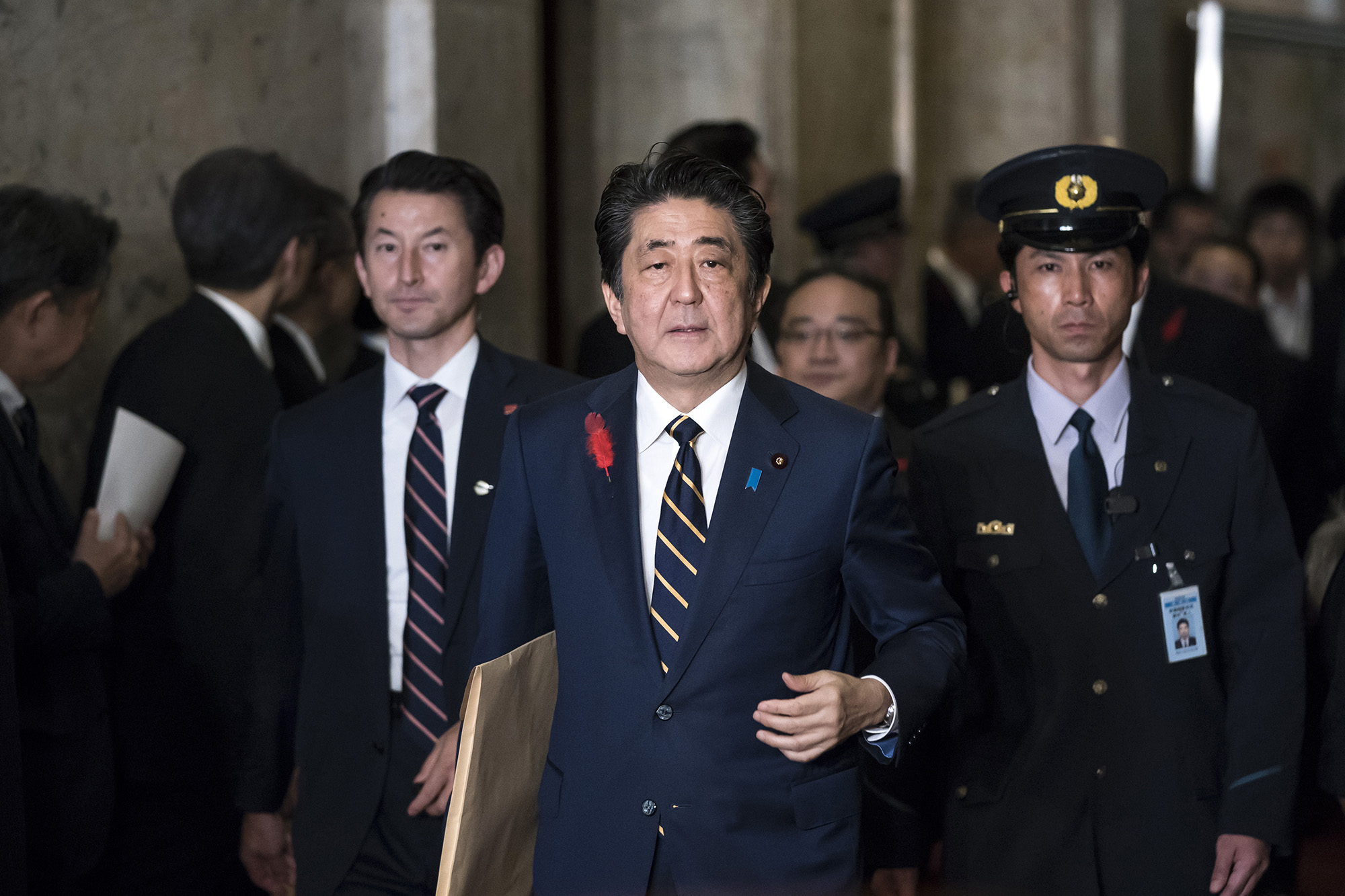 Japan's Prime Minister Shinzo Abe arrives at the chamber to deliver his policy speech at the lower house of the parliament on October 4, 2019 in Tokyo.