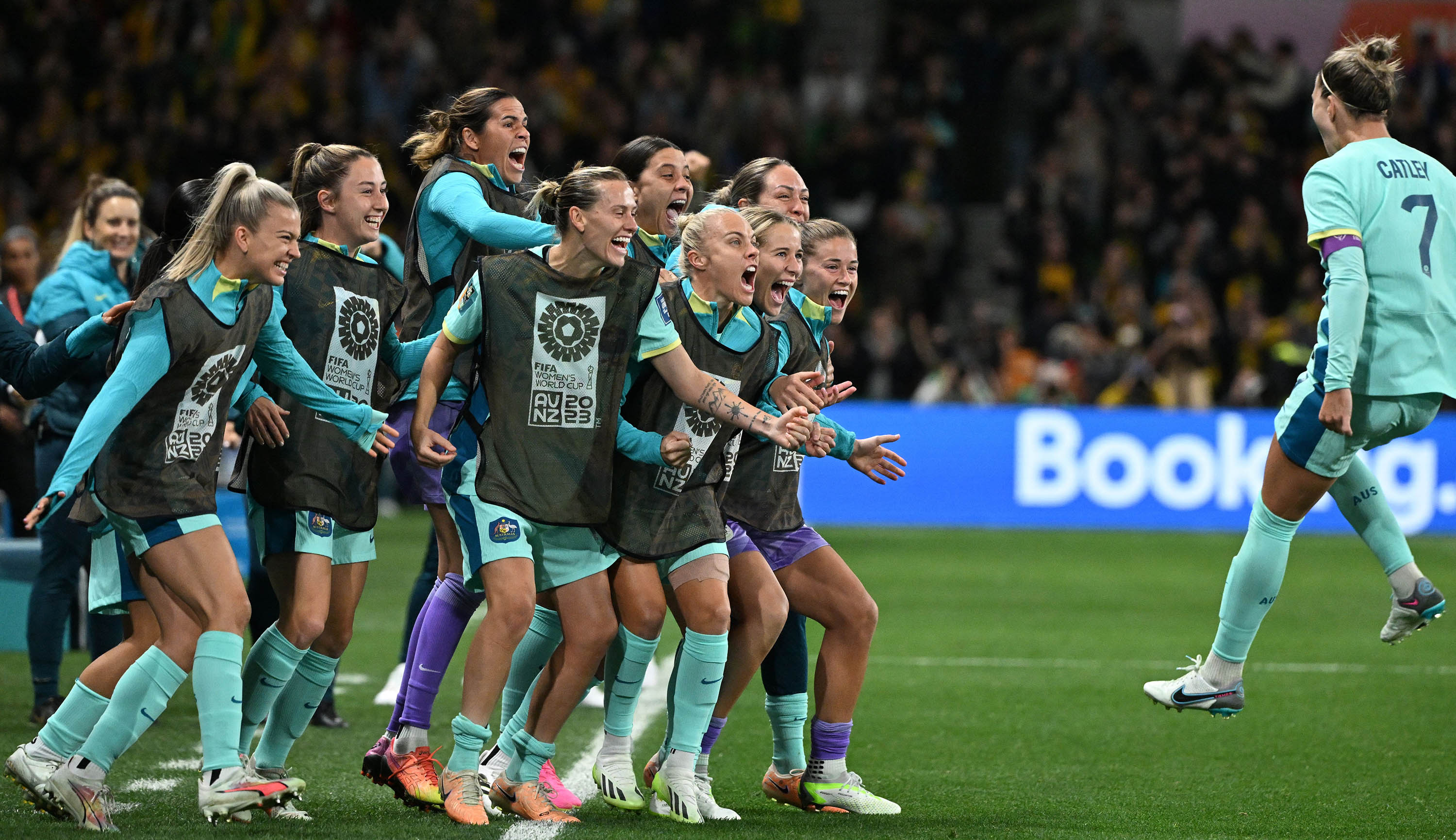 Australia's defender Stephanie Catley, right, celebrates with teammates after scoring her team's fourth goal from the penalty kick during the match between Canada and Australia at Melbourne Rectangular Stadium, in Melbourne, Australia, on July 31.