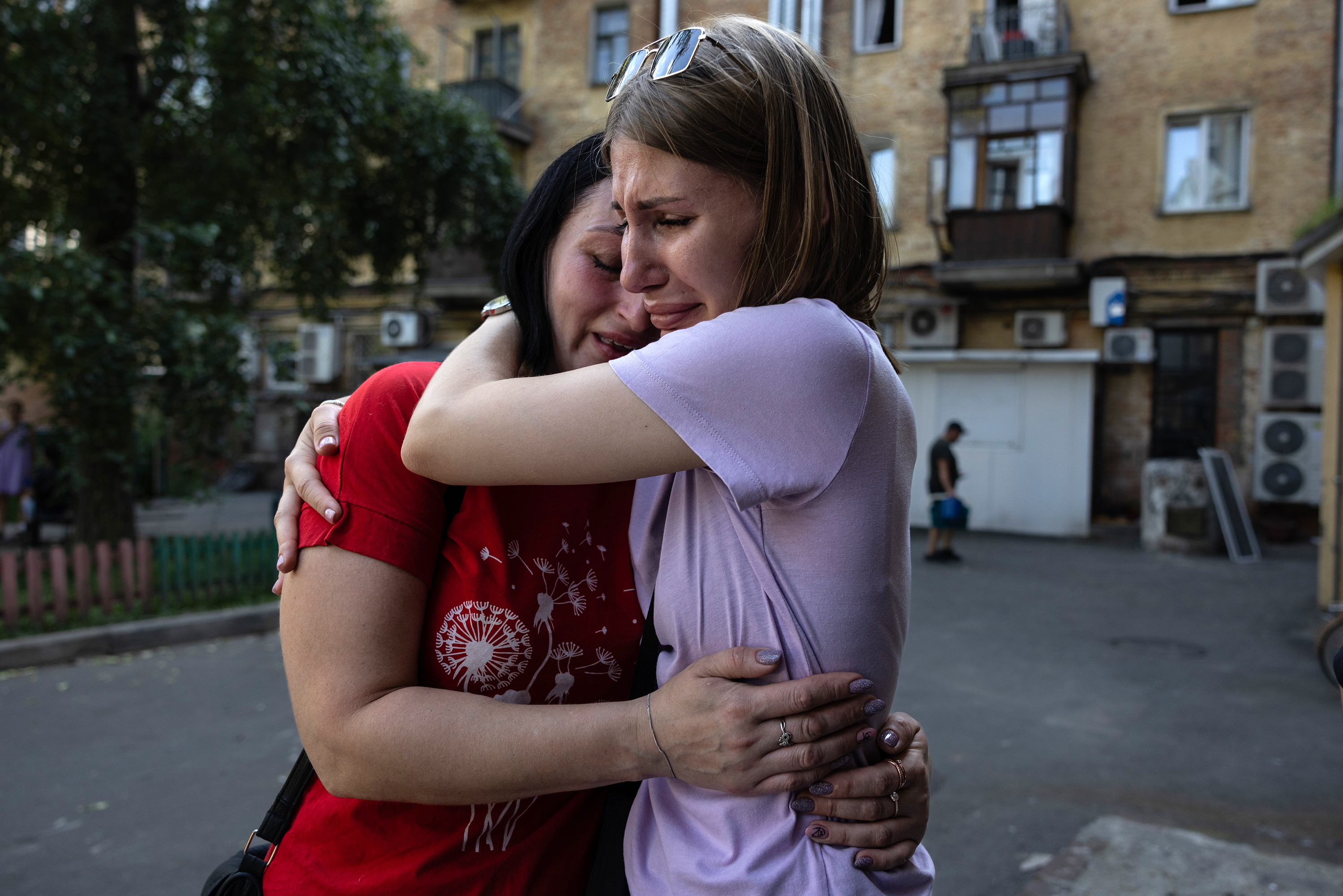 People react to the Russian missile strike in Chernihiv, Ukraine, on August 19. 