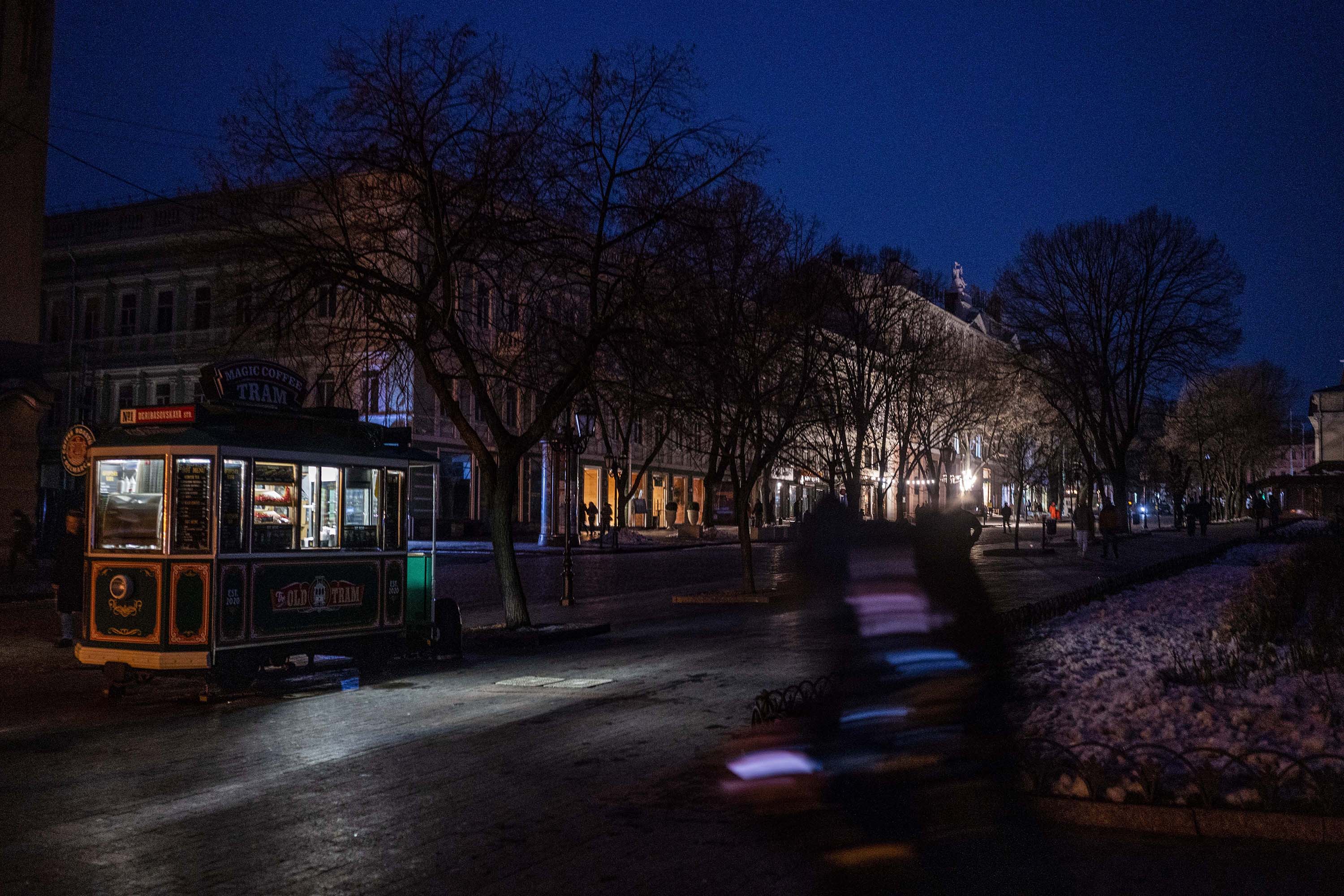 A dark street is pictured on February 4, after an accident at an electricity substation in Odesa, Ukraine. 