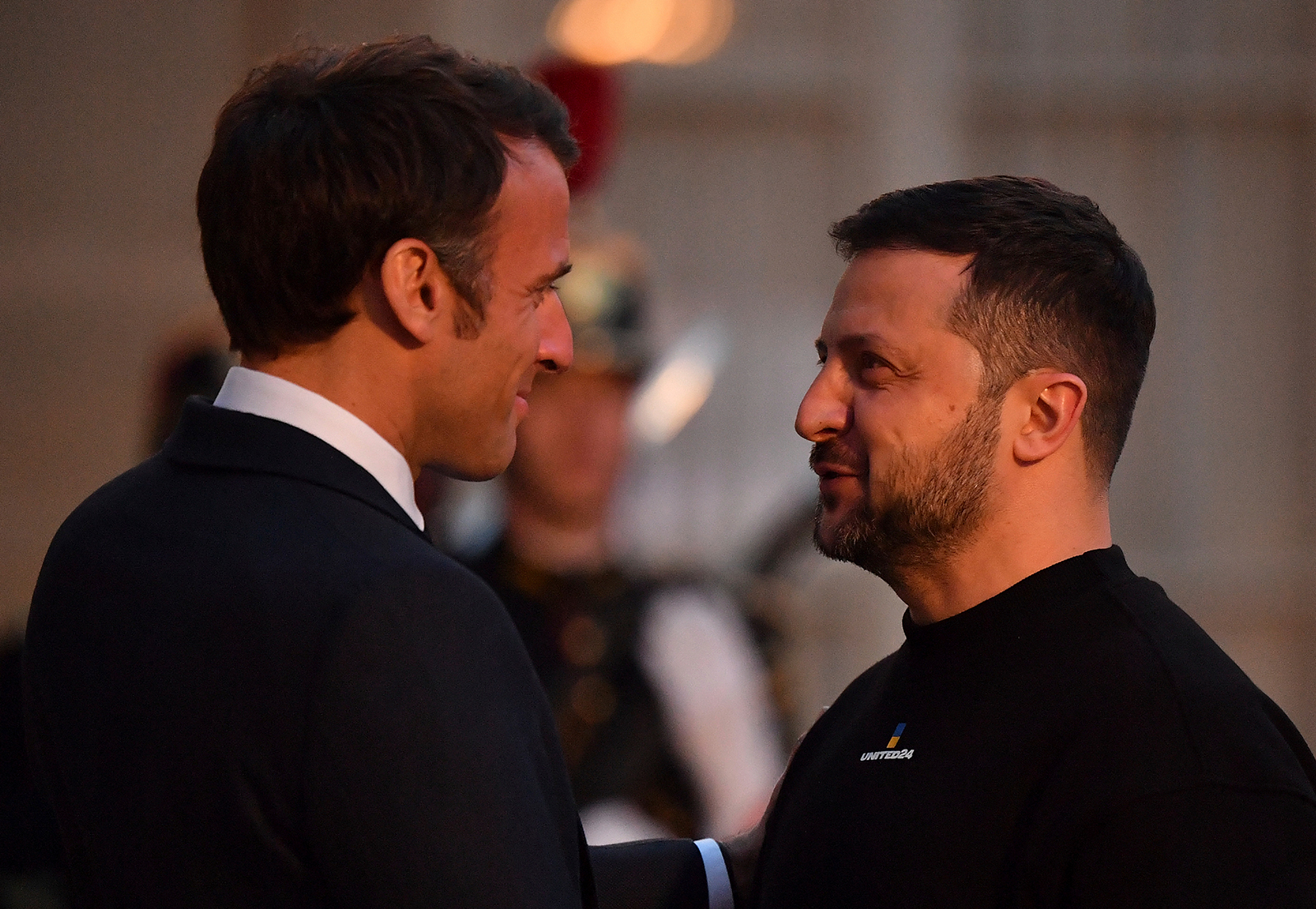 Volodymyr Zelensky is welcomed by Emmanuel Macron upon his arrival at the Elysee presidential palace in Paris on May 14.