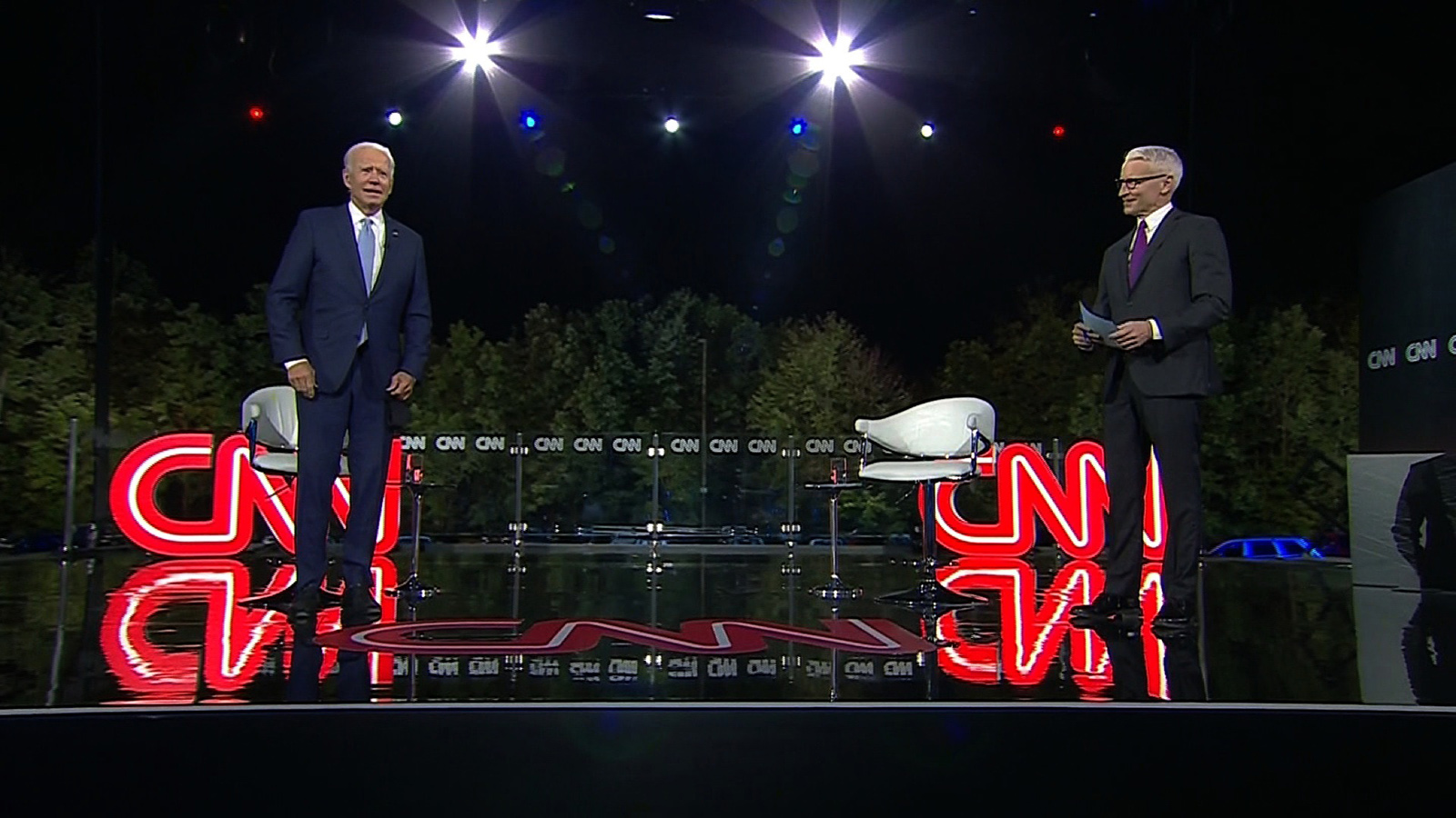 Democratic presidential nominee Joe Biden and CNN's Anderson Cooper speak on stage at the CNN Presidential Town Hall in Scranton, Pennsylvania, on Thursday.