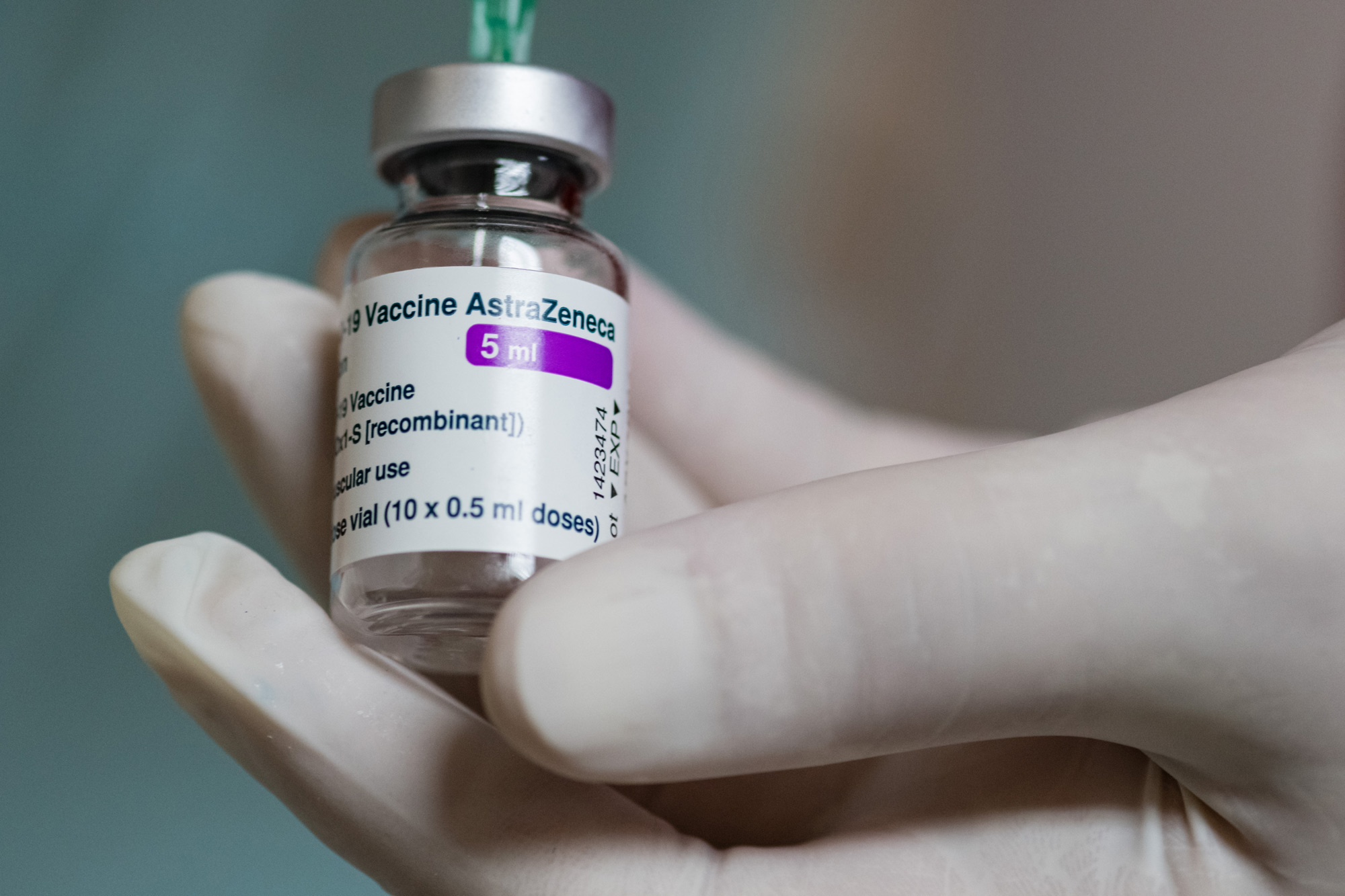 A vial of AstraZeneca Covid-19 vaccine is handled on March 15 in Dippoldiswalde, Germany. 