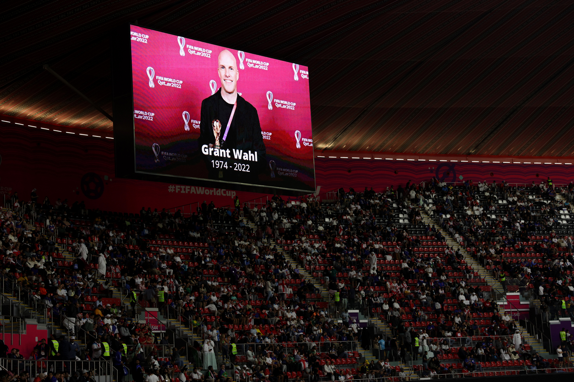 Before the England and France match, a photo of Grant Wahl is shown at Al Bayt Stadium in Al Khor, Qatar on Saturday.