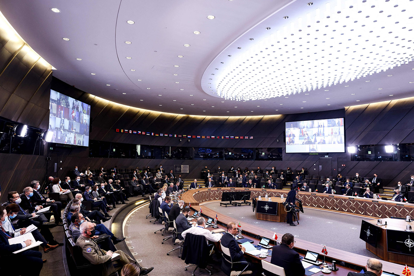 NATO Secretary General Jens Stoltenberg delivers opening remarks from NATO headquarters in Brussels during a virtual summit of NATO heads of state and government on February 25. 