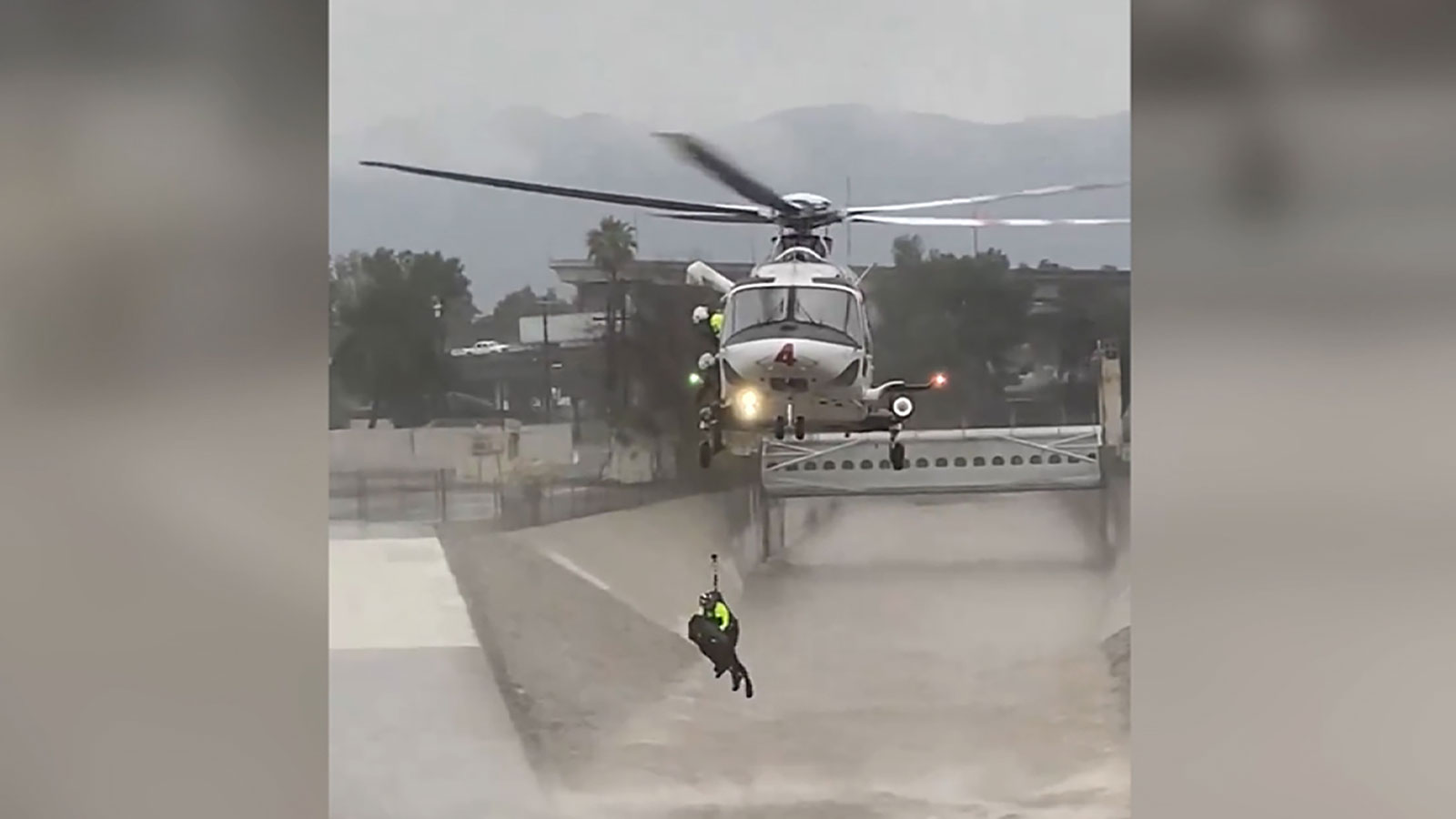 Los Angeles Fire Department released video of the swift-water rescue after a man jumped into the Los Angeles River in an attempt to save a dog.
