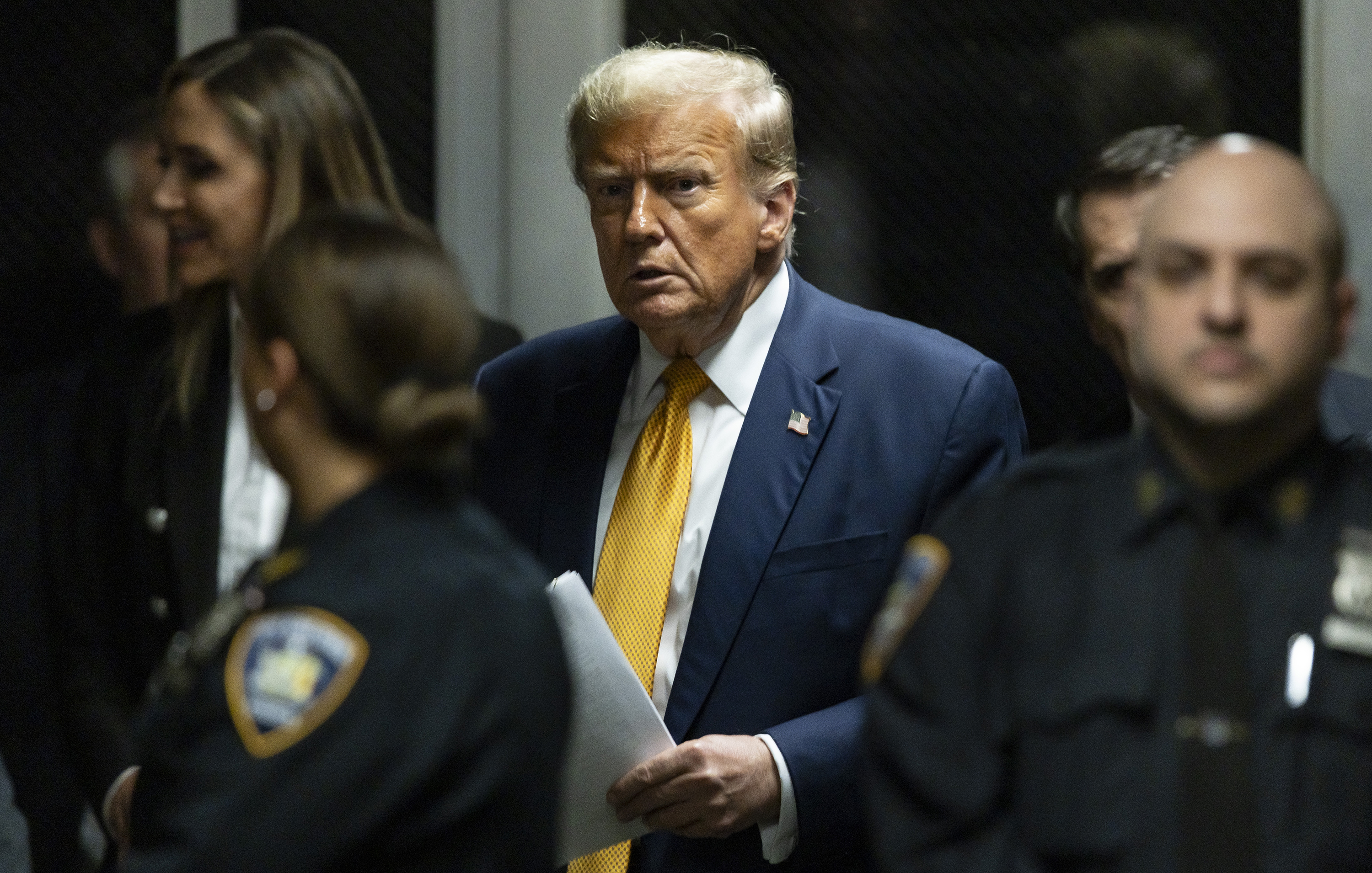 Former President Donald Trump leaves the courtroom at the end of the day's proceedings in his hush money criminal trial in New York on May 14.