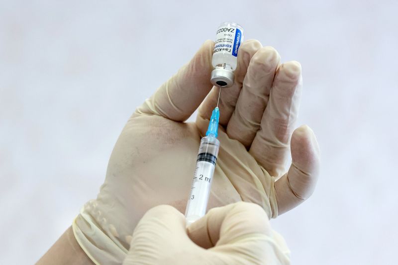 A nurse prepares a syringe of the Sputnik V vaccine at a clinic in Moscow on December 28, 2020.