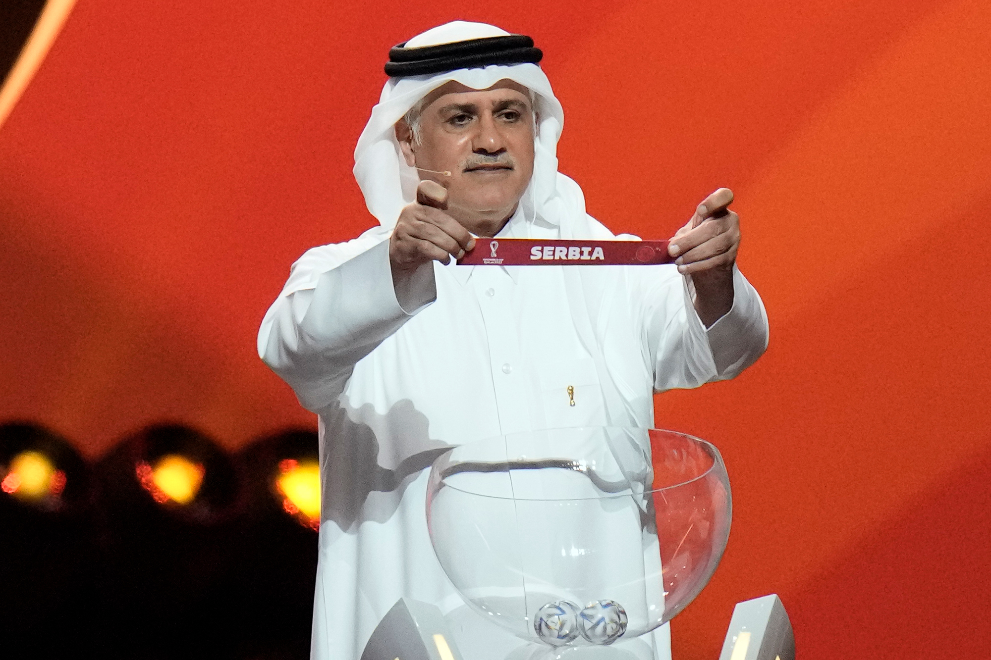Adel Ahmed MalAllah draws Serbia during the FIFA World Cup draw on April 1 in Doha, Qatar. 