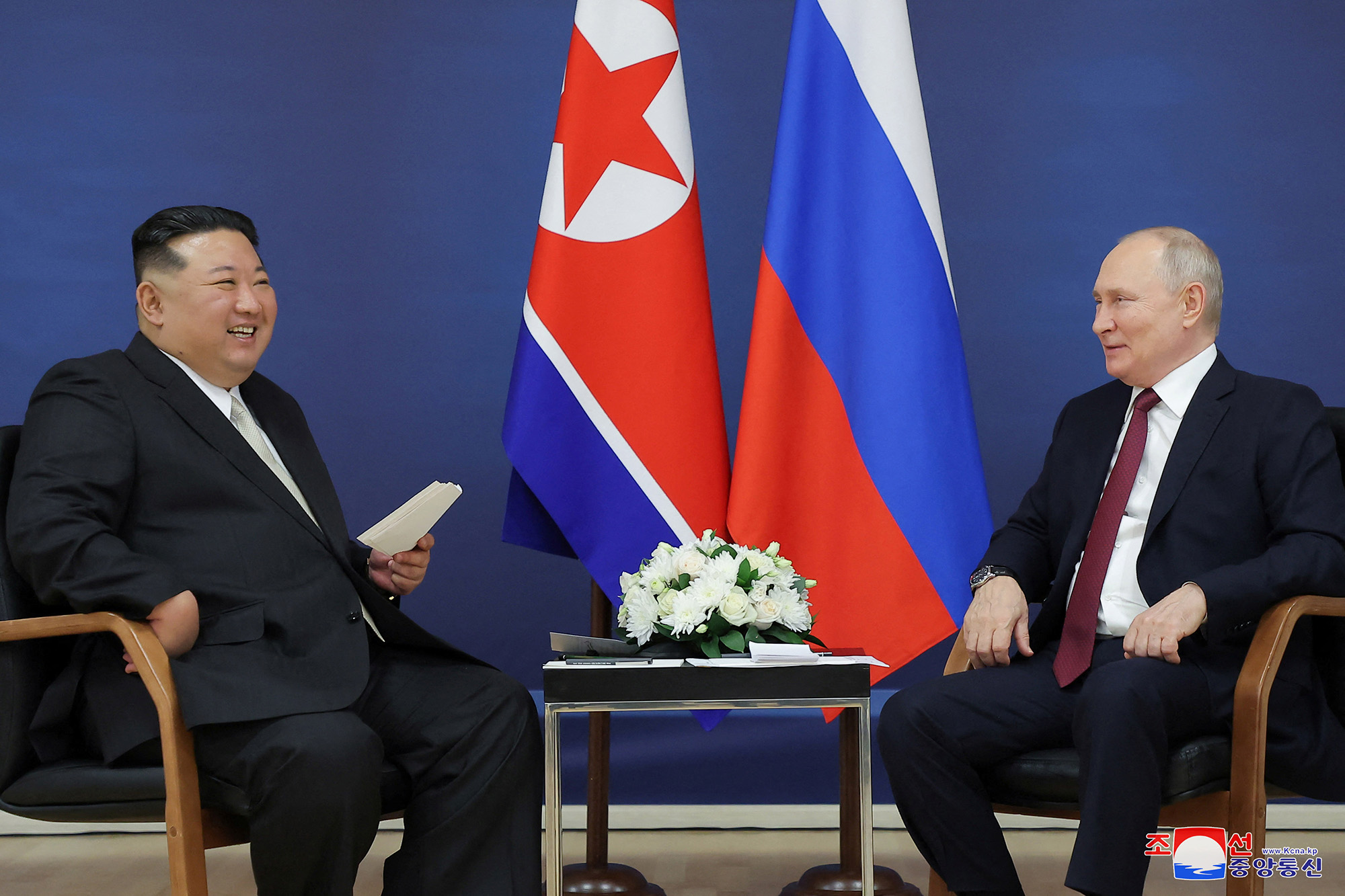 Russia's President Vladimir Putin, right, and North Korea's leader Kim Jong Un attend a meeting at the Vostochny Cosmodrome in the far eastern Amur region, Russia, on September 13.