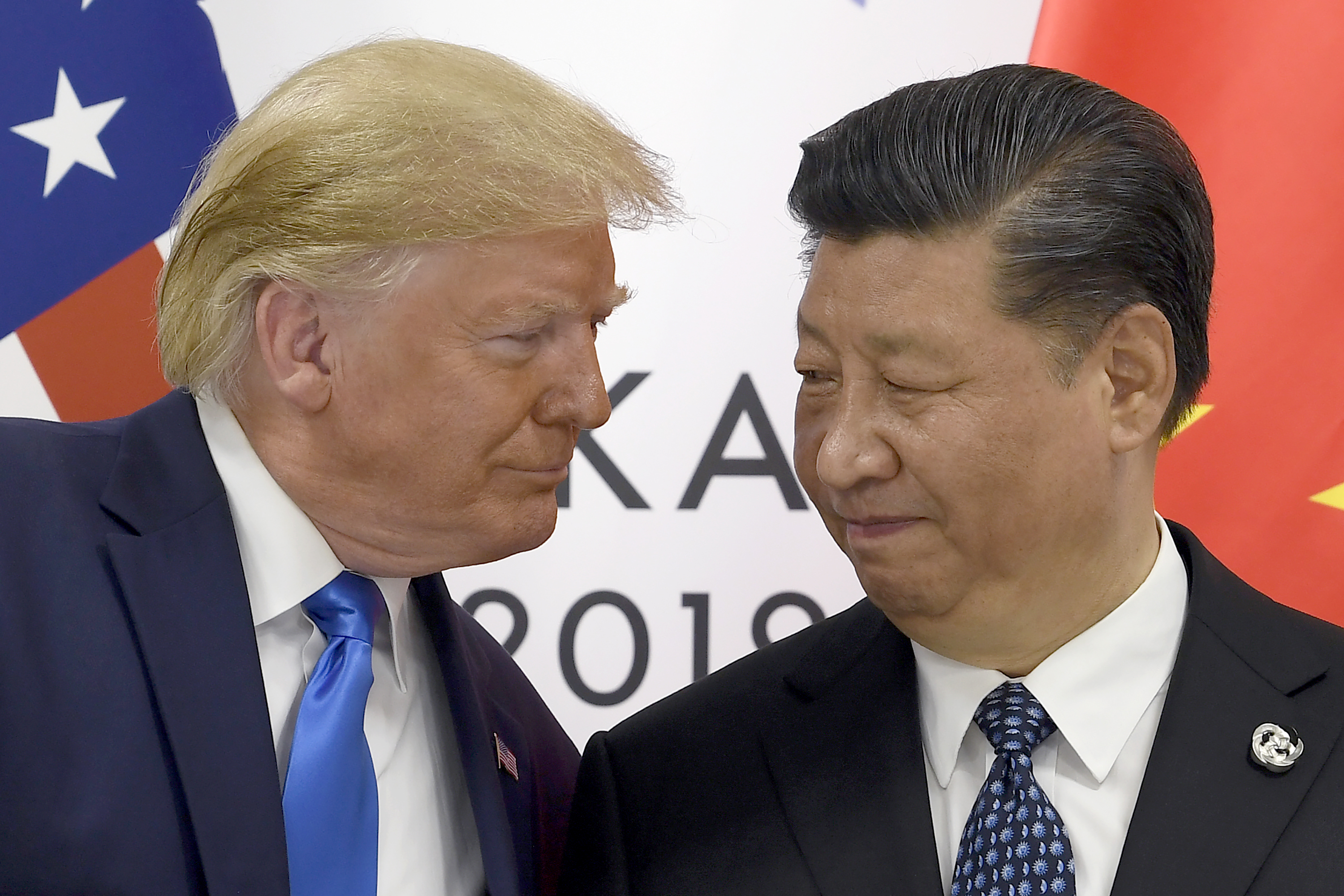 President Donald Trump, left, meets with Chinese President Xi Jinping during a meeting on the sidelines of the G-20 summit in Osaka, Japan, Saturday, June 29.