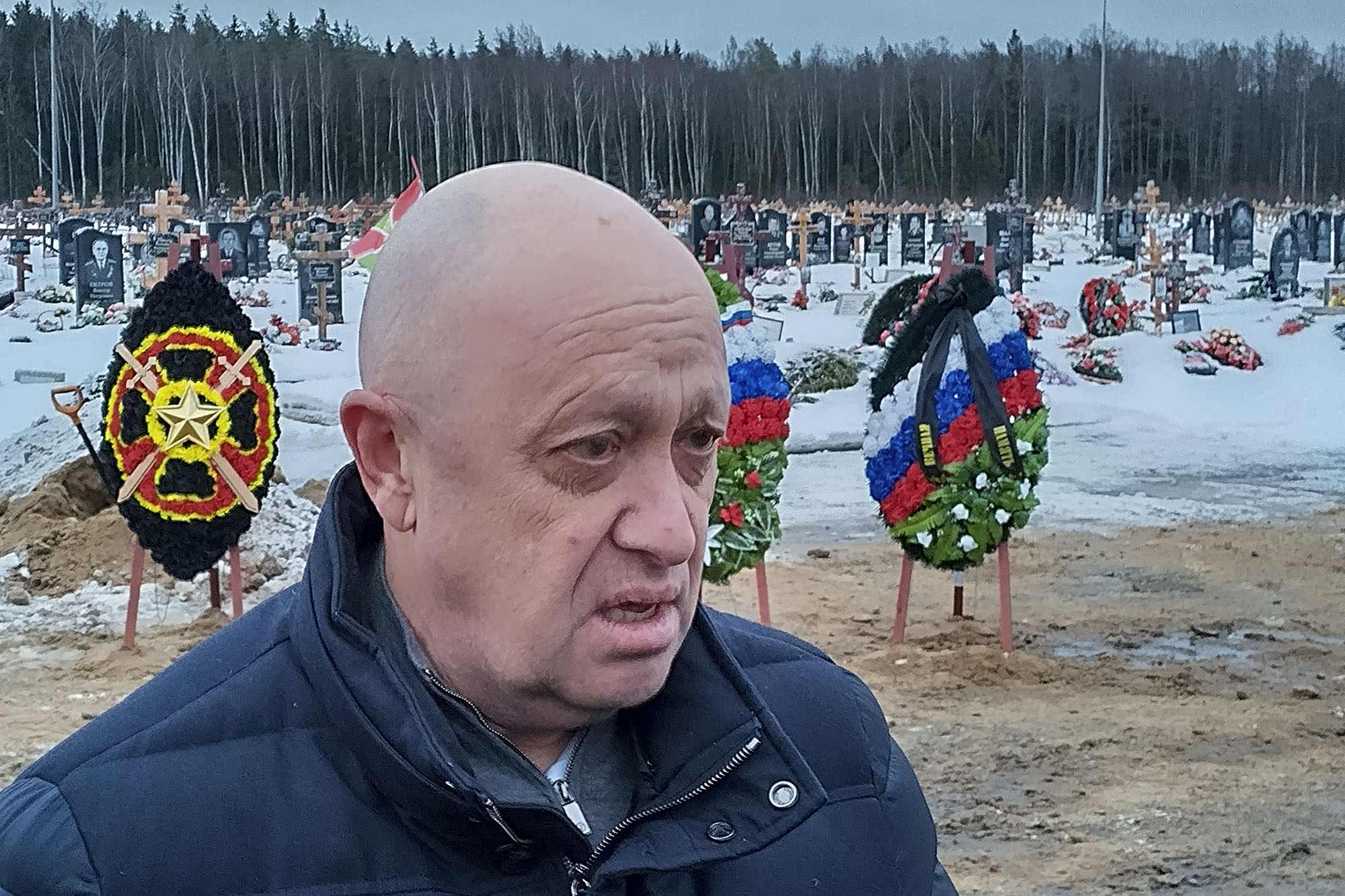 Wagner Group head Yevgeny Prigozhin attends a funeral at the Beloostrovskoye cemetery outside St. Petersburg, Russia, on December 24.