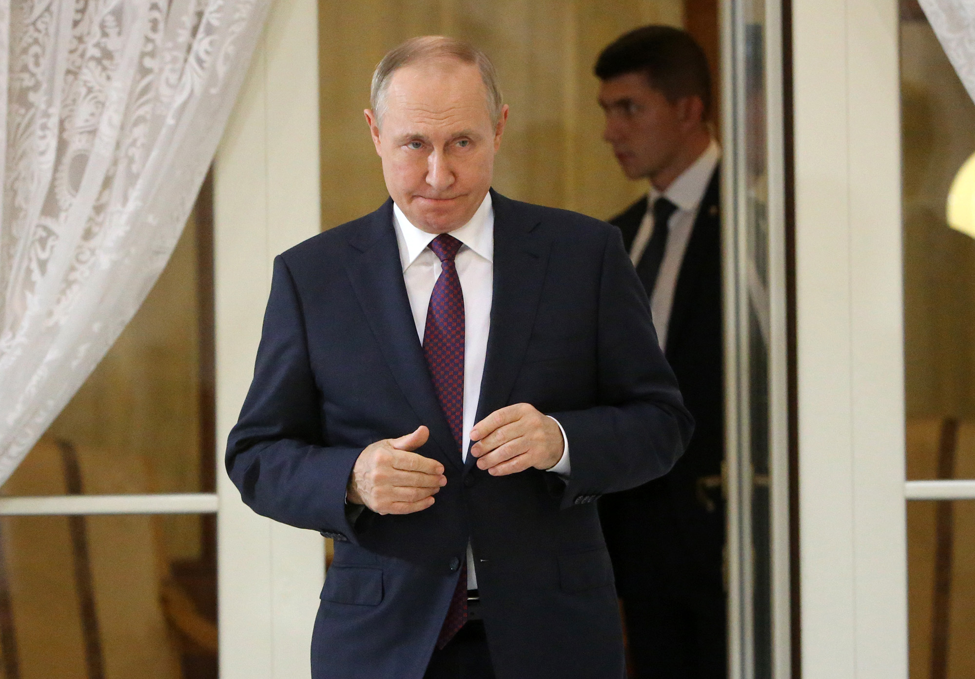 Russian President Vladimir Putin enters the hall for his press conference in Sochi, Russia on October 31.
