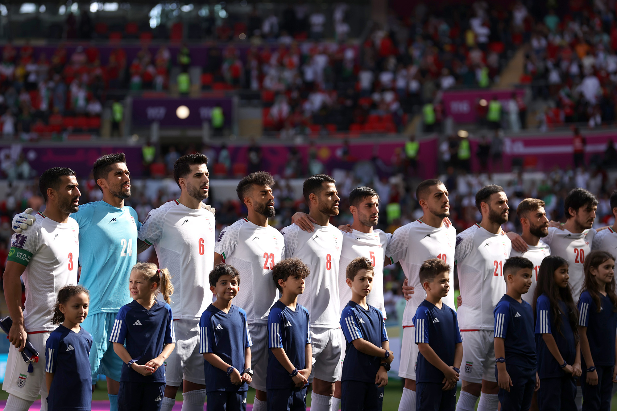 Iran players line up for the national anthem prior to the FIFA World Cup Qatar 2022 Group B match between Wales and IR Iran at Ahmad Bin Ali Stadium on November 25.