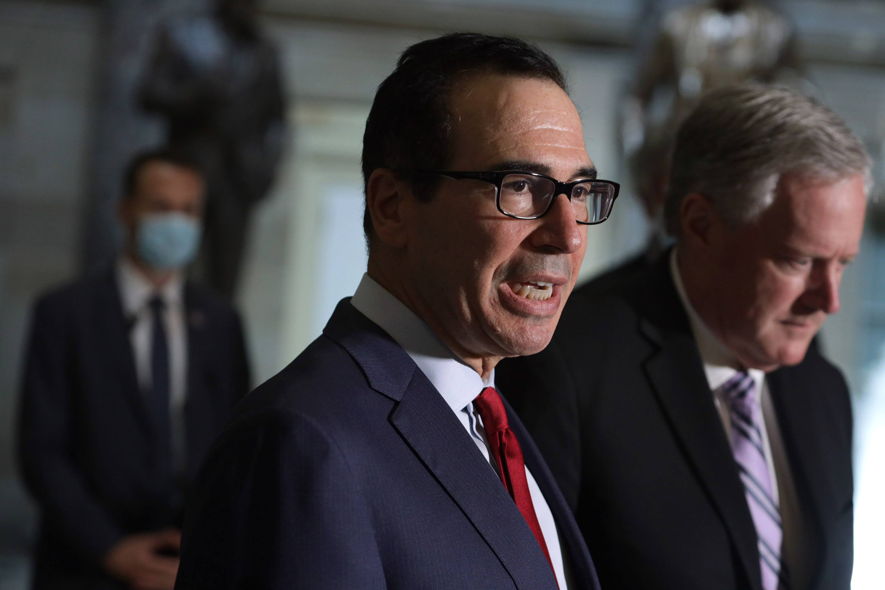 Secretary of the Treasury Steven Mnuchin speaks to members of the press at the U.S. Capitol on August 7 in Washington, DC. 