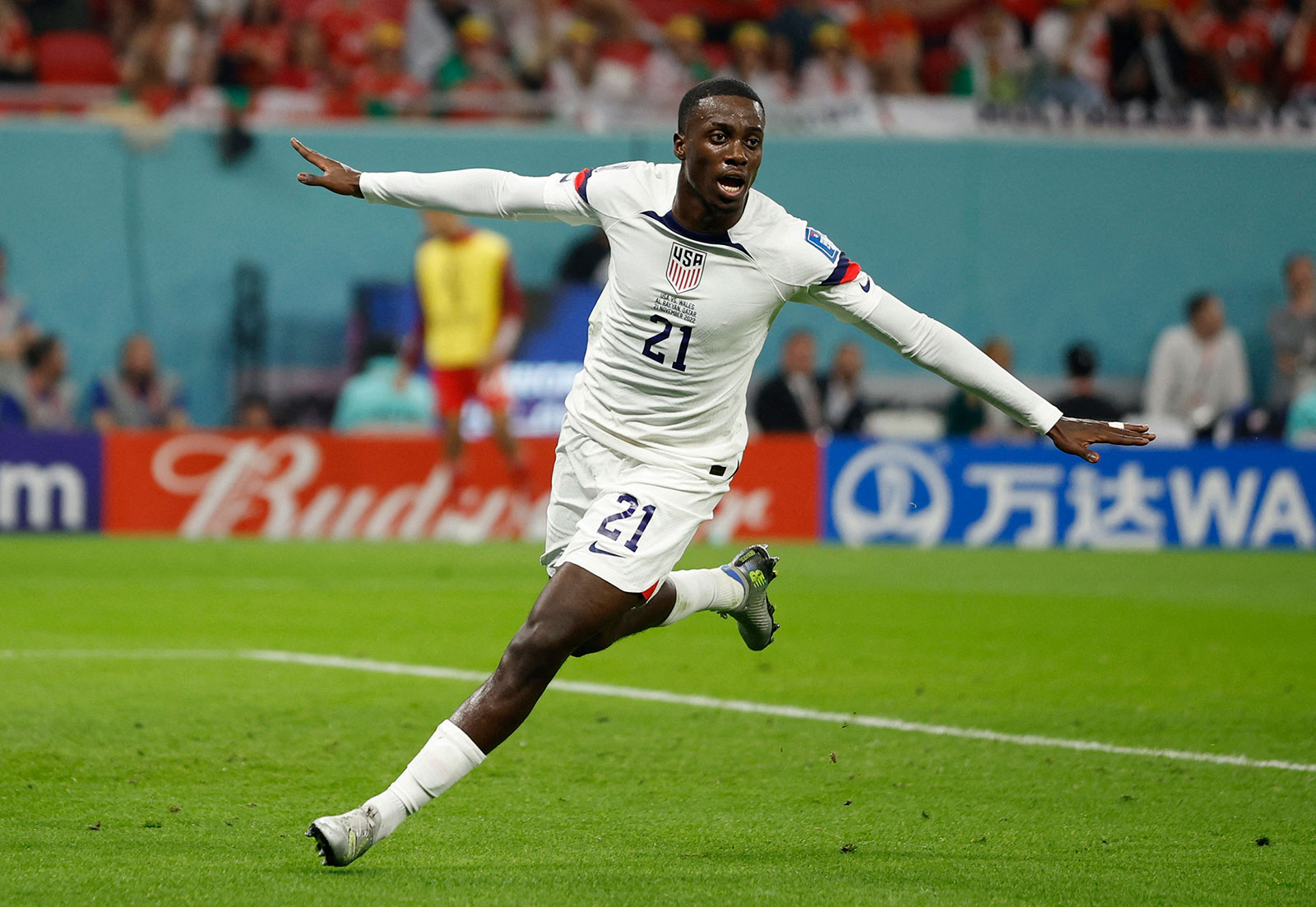USA's Timothy Weah celebrates after scoring the first goal of the match against Wales on November 21.