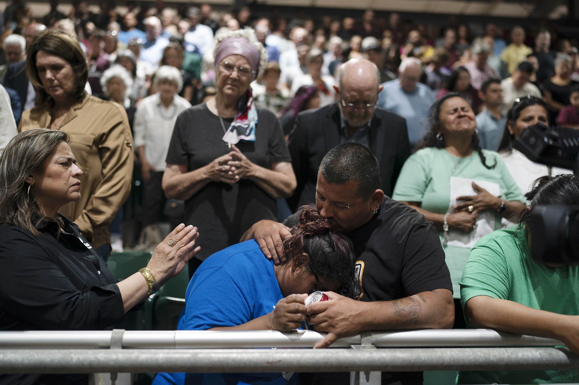 Family members of one of the victims killed in Tuesday's shooting at Robb Elementary School comfort each other during a prayer vigil in Uvalde, Texas on May 25. 