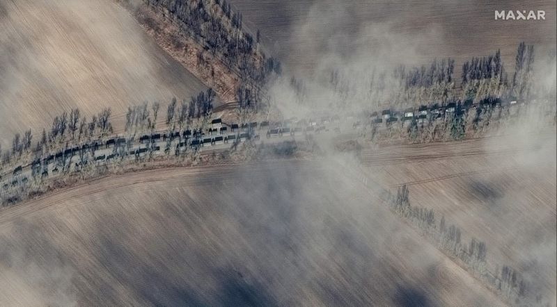 New satellite images show a more than 3-mile-long Russian military convoy on a roadway that heads toward Kyiv.